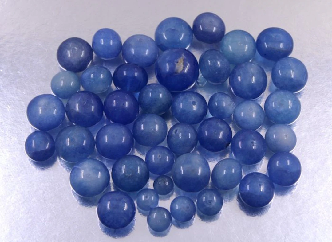 41 Really beautiful hand made round plane tanzanite beads - 675 Cts