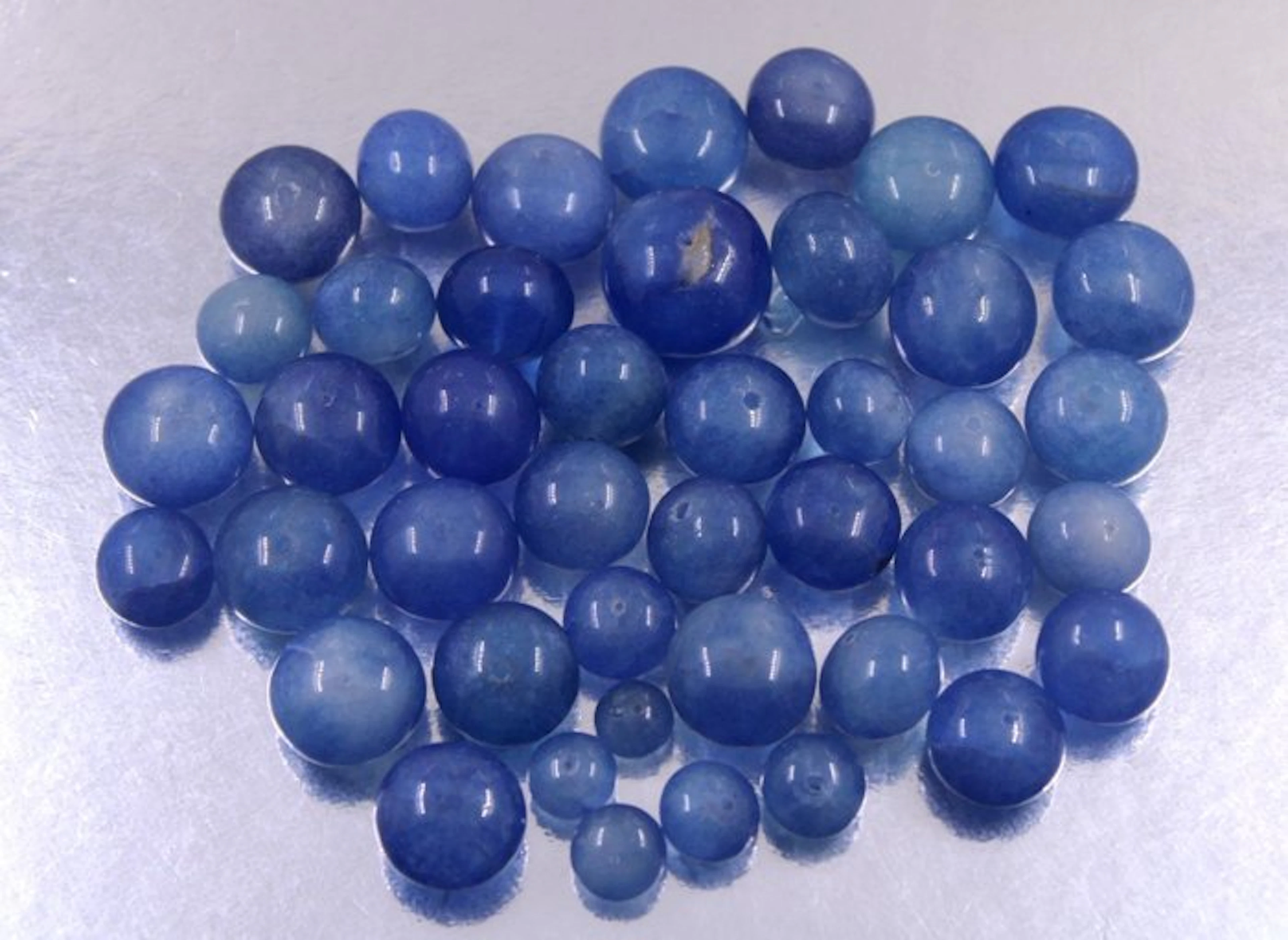 41 Really beautiful hand made round plane tanzanite beads - 675 Cts