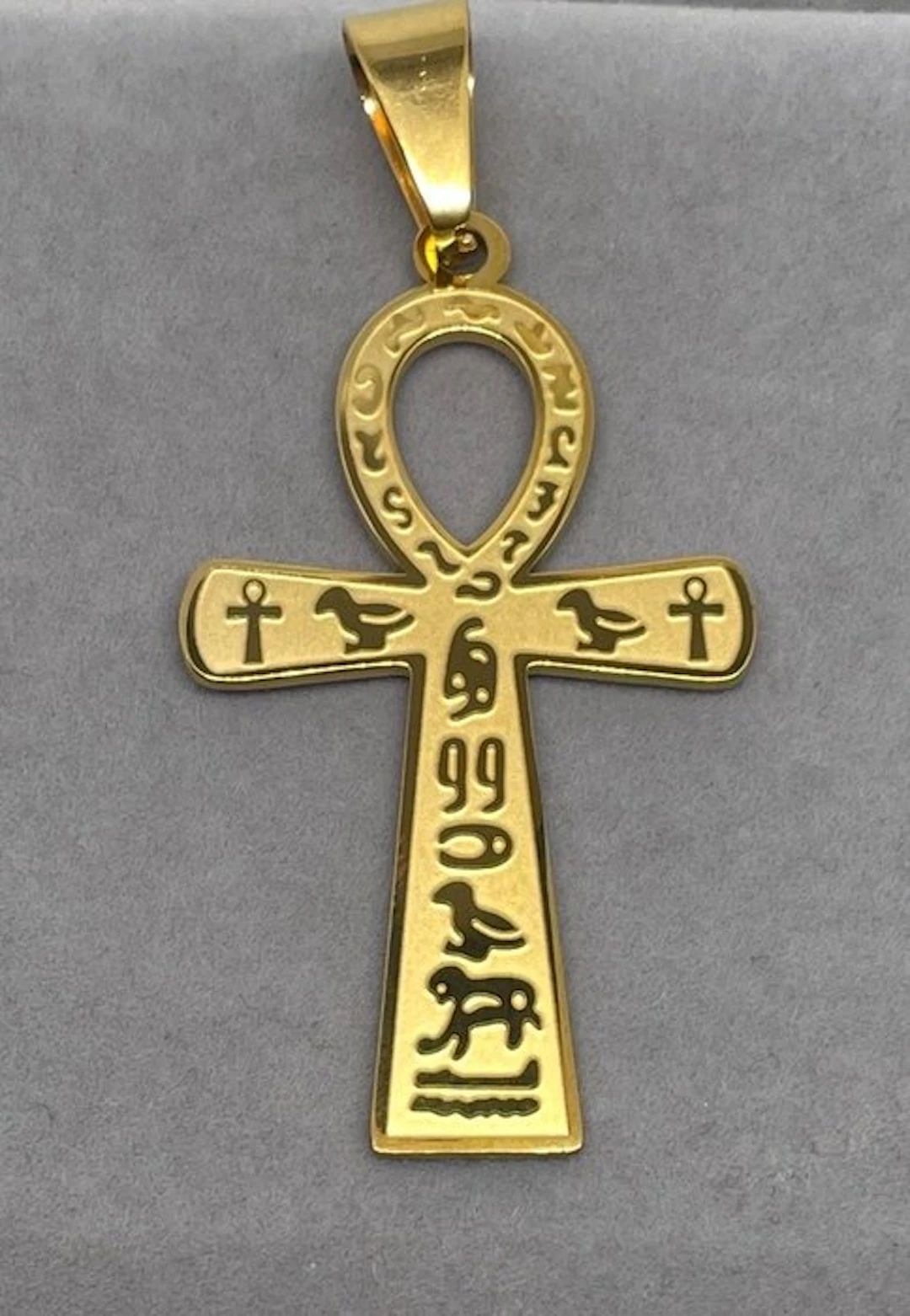 An Egyptian ankh plated in 18-karat gold – a symbol of...