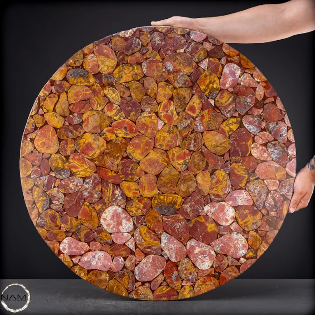 Red jasper in an impressive round tabletop with a unique natural texture