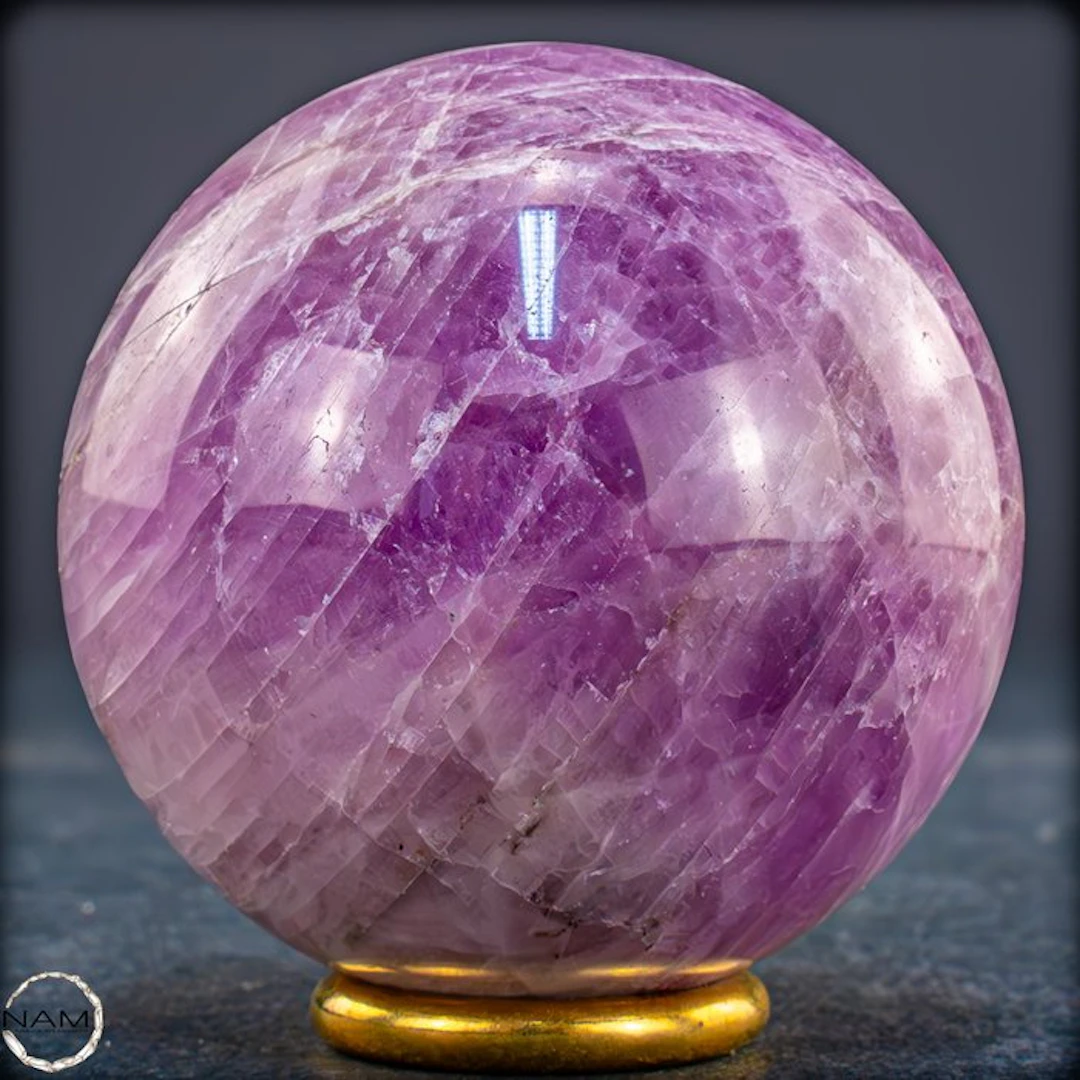 Majestic kunzite sphere with a fascinating cat's-eye...