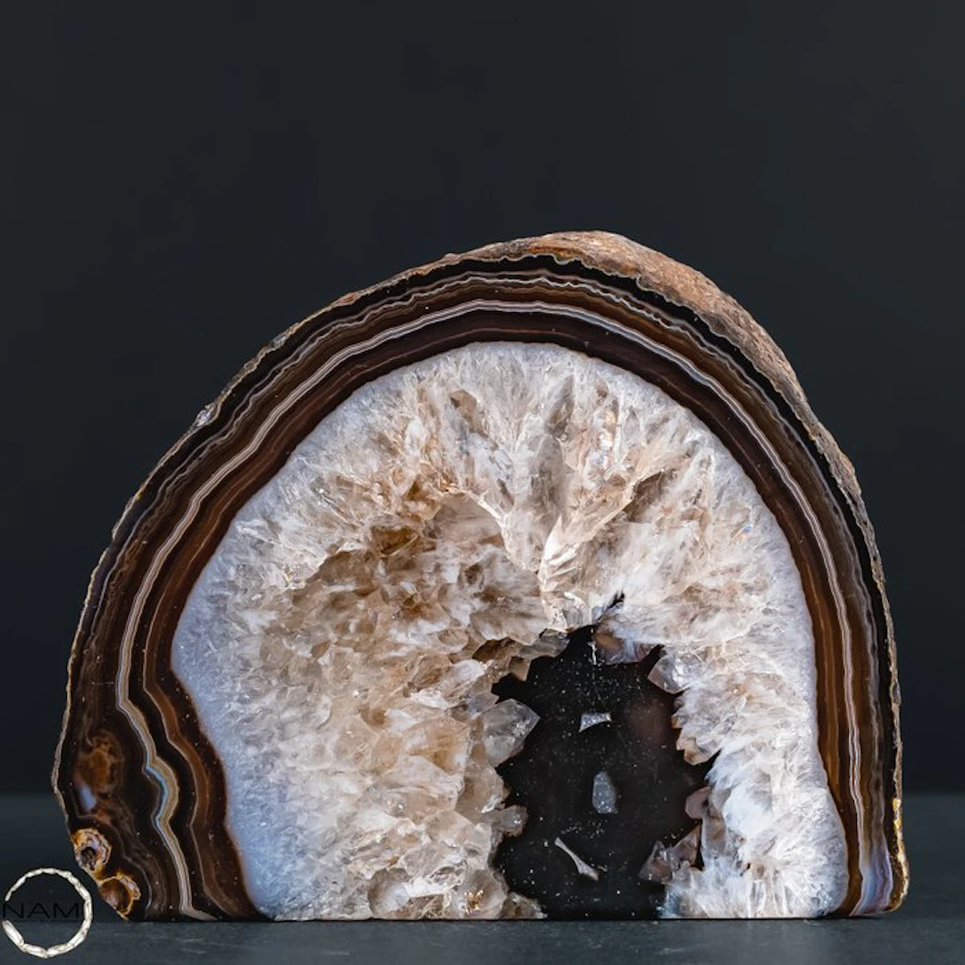 Pink-colored agate disc with a fascinating crystal center...