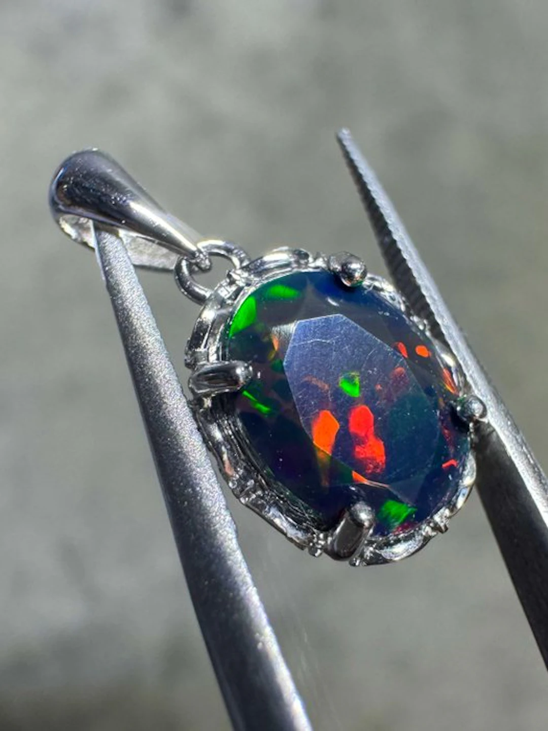 Natural Ethiopian black opal pendant set in 925 silver