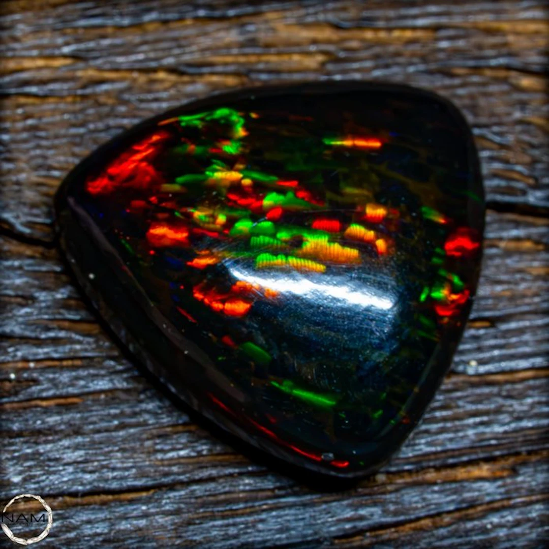 The finest Black Opal in glowing rainbow colors—a...