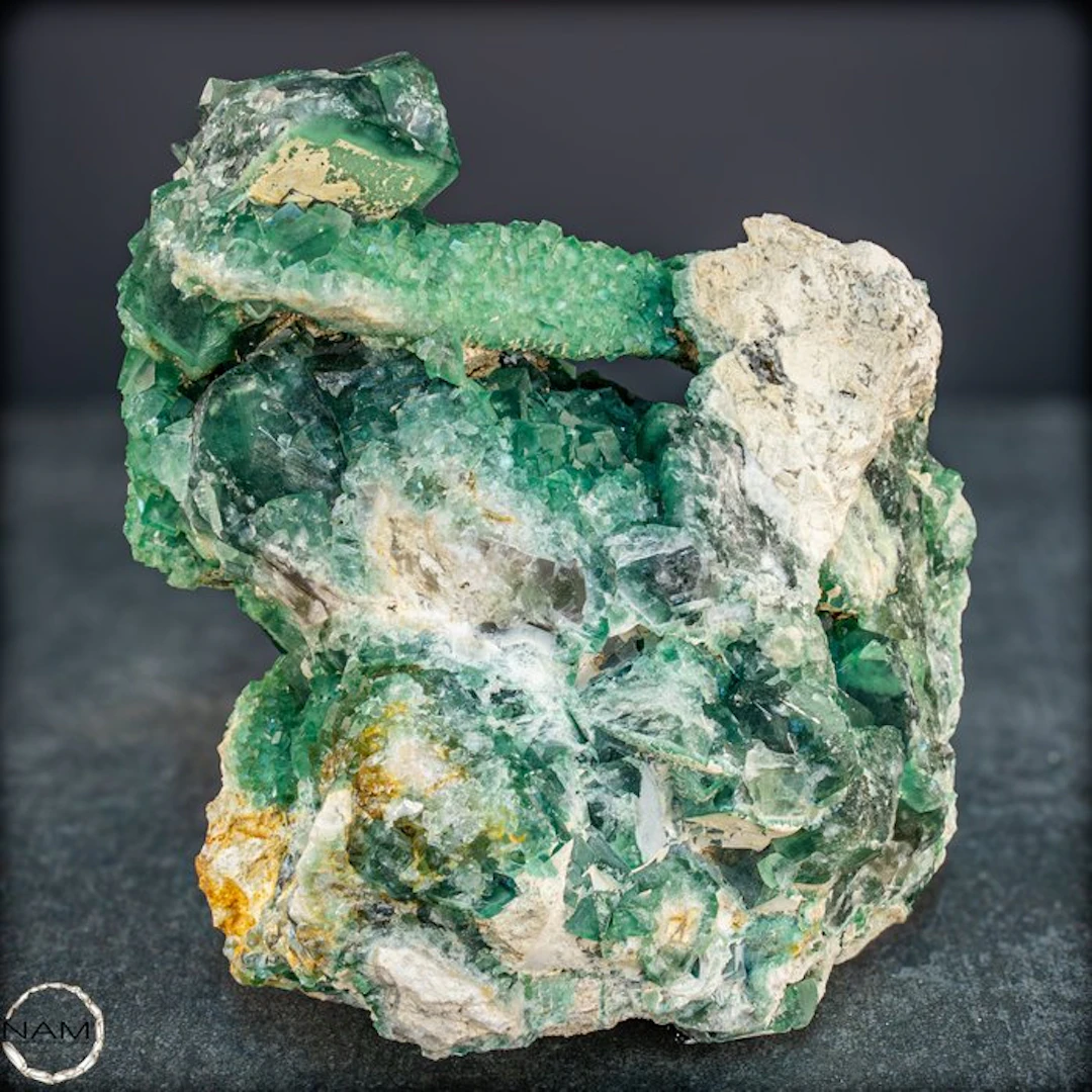 Exceptional natural green fluorite with a freestanding...