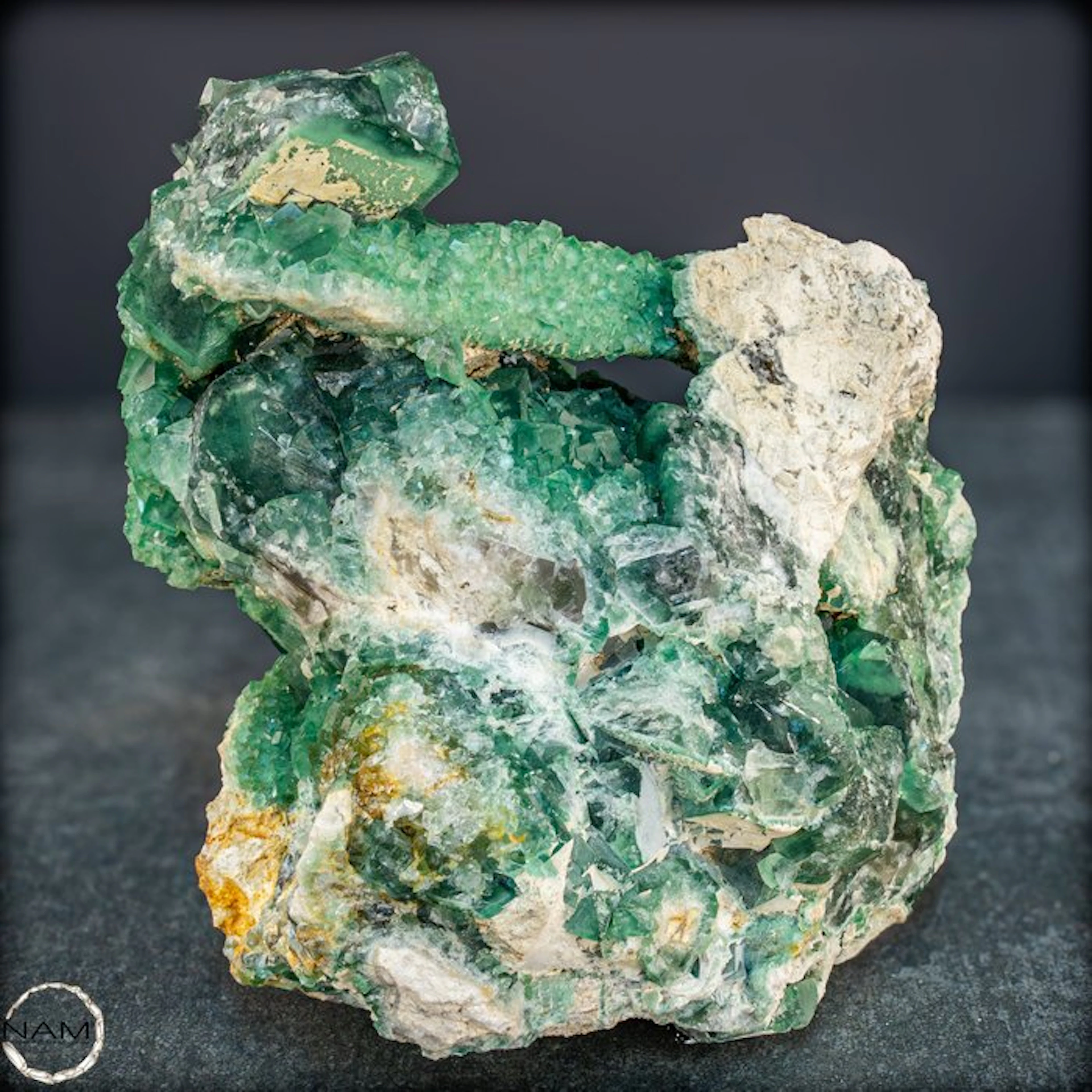 Exceptional natural green fluorite with a freestanding...