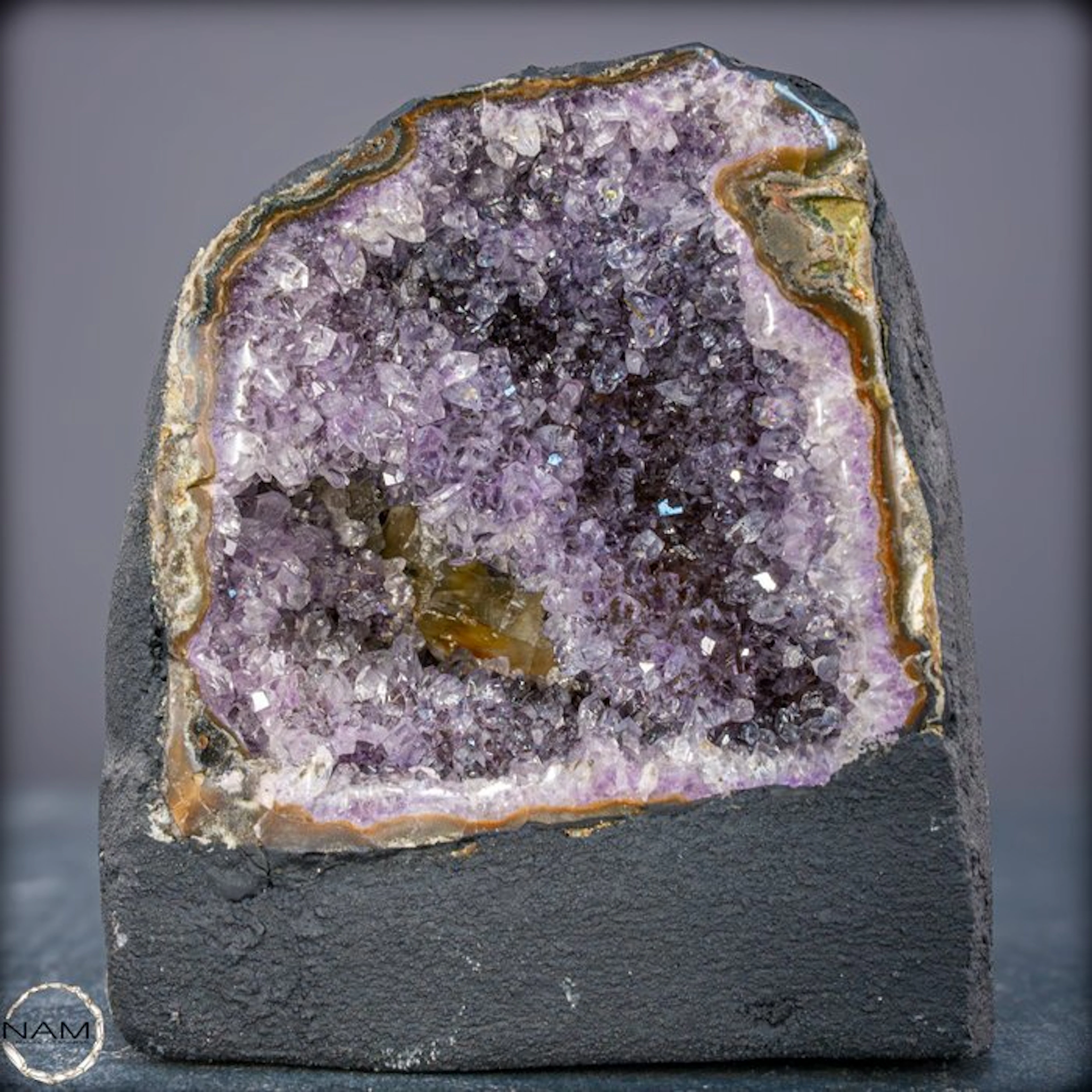 Natural amethyst crystal cathedral with calcite crystal...
