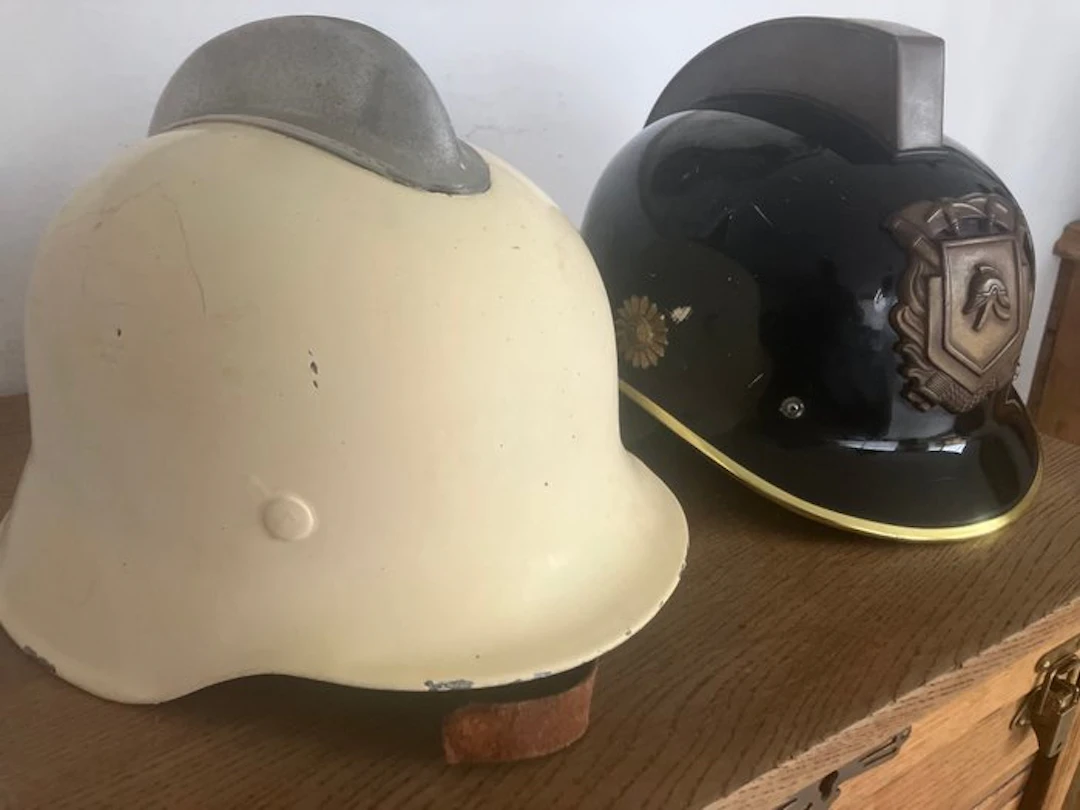 Military helmet - 2 firefighter helmets - Netherlands / Germany.