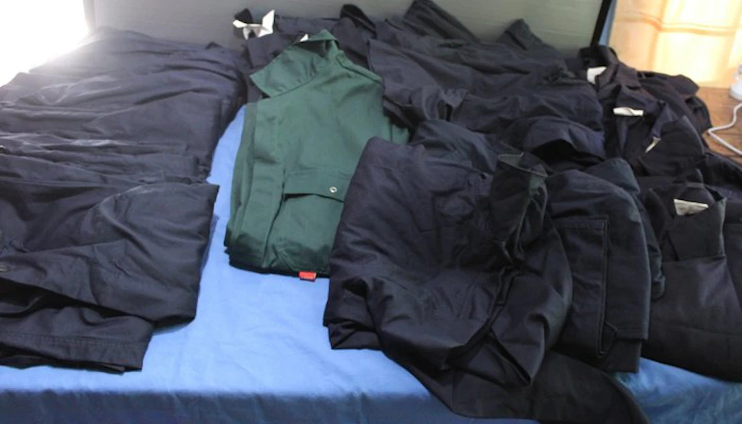 Netherlands - 12 overalls / 6 jackets Police / Navy...