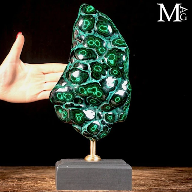Vivid green botryoidal malachite with eye-like concentric...
