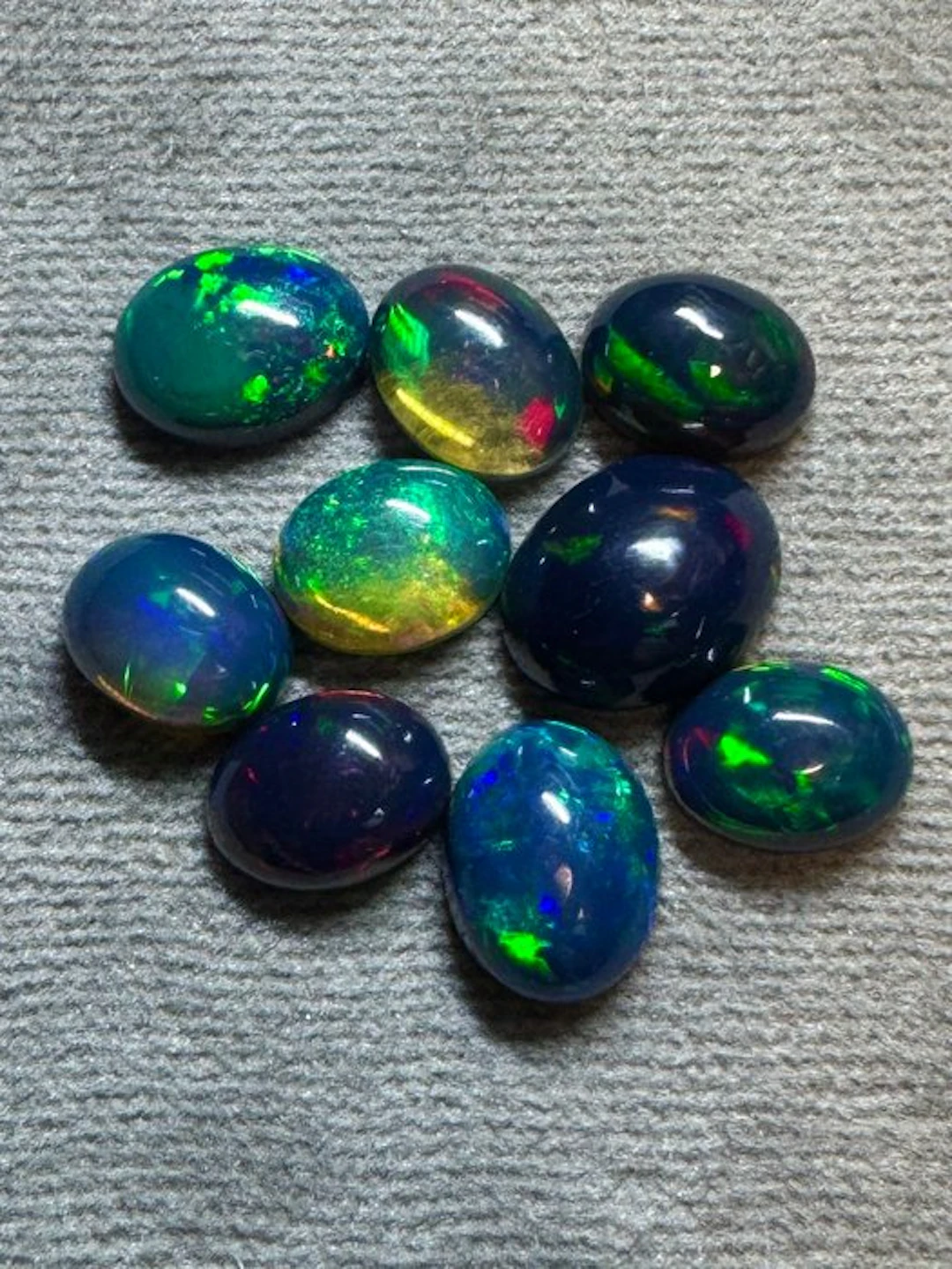 Lot of 9 Ethiopian black opal cabochons - 9.95 ct Cabochons- 1.99 g