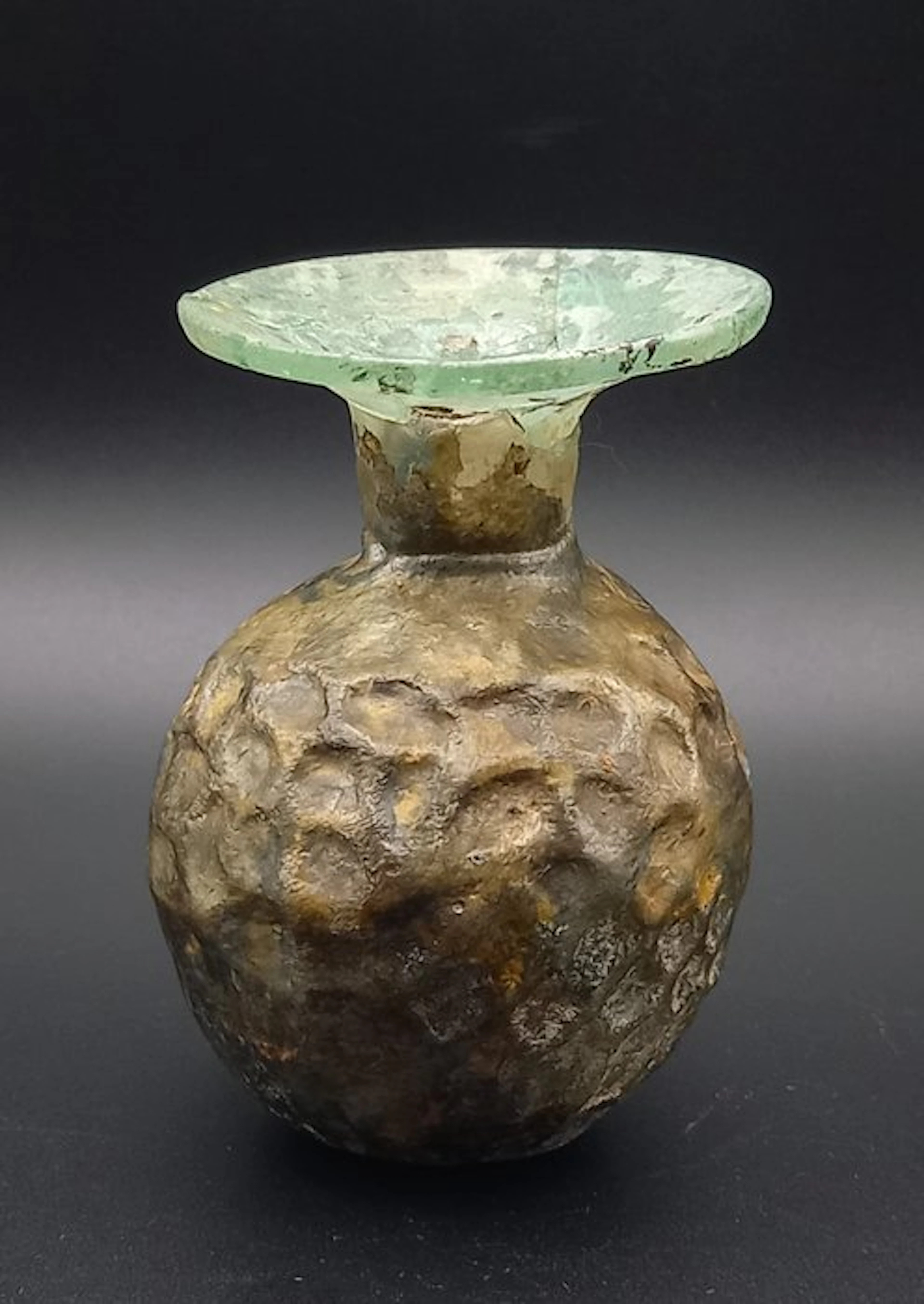 Ancient Roman Blown-form sprinkler with a faceted body and a wide funnel outlet