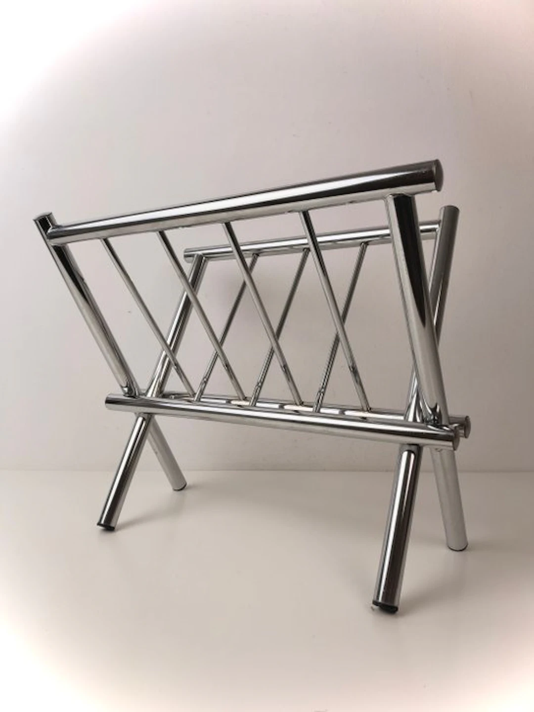 Magazine rack - Designer magazine rack made of chromed steel – foldable