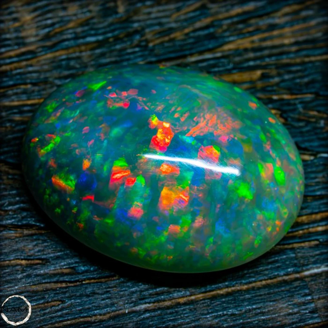 Black Opal – A luminous blaze of color like a hidden universe. 15.5- 3.1 g