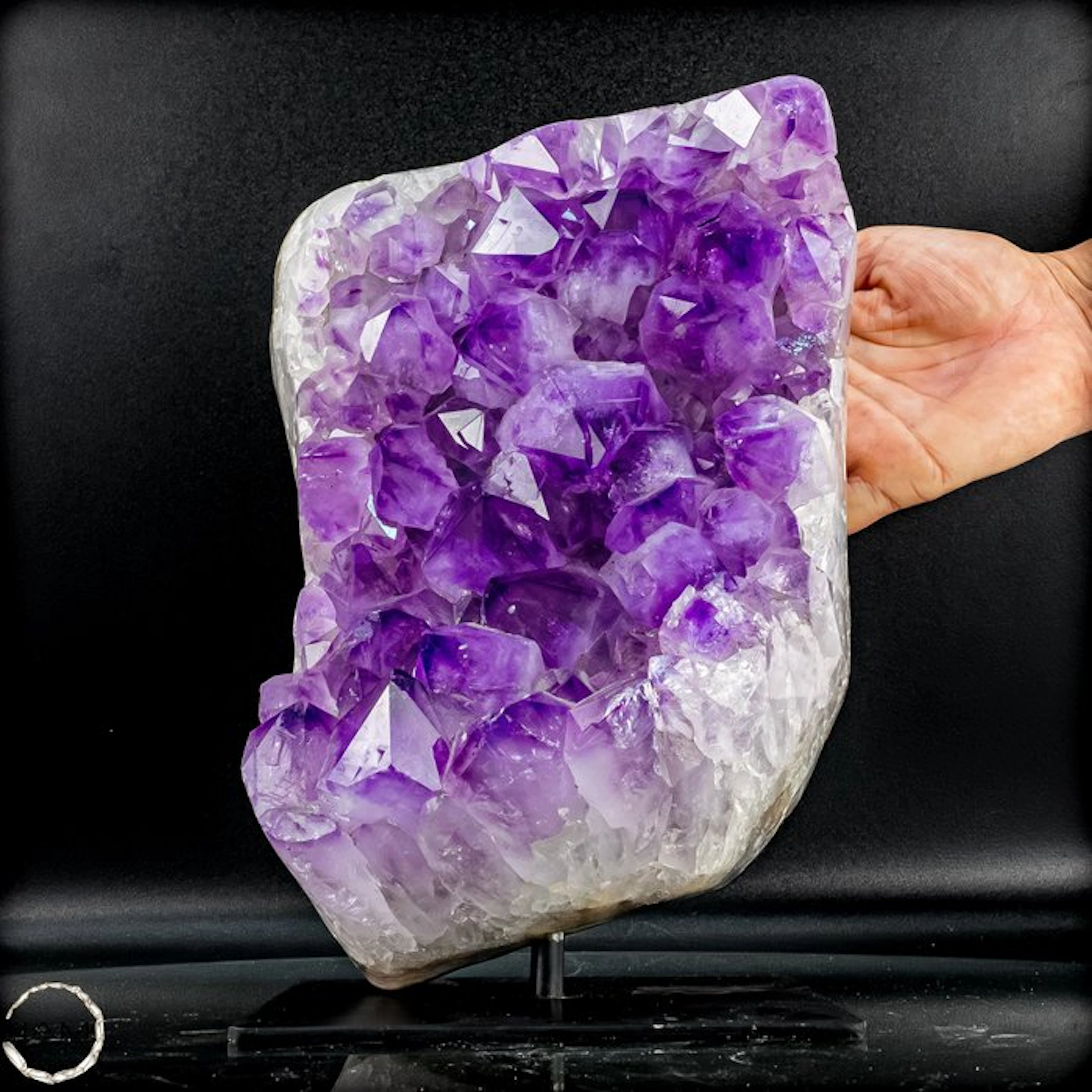 Stunning amethyst on a stand — majestic crystal energy in an elegant display
