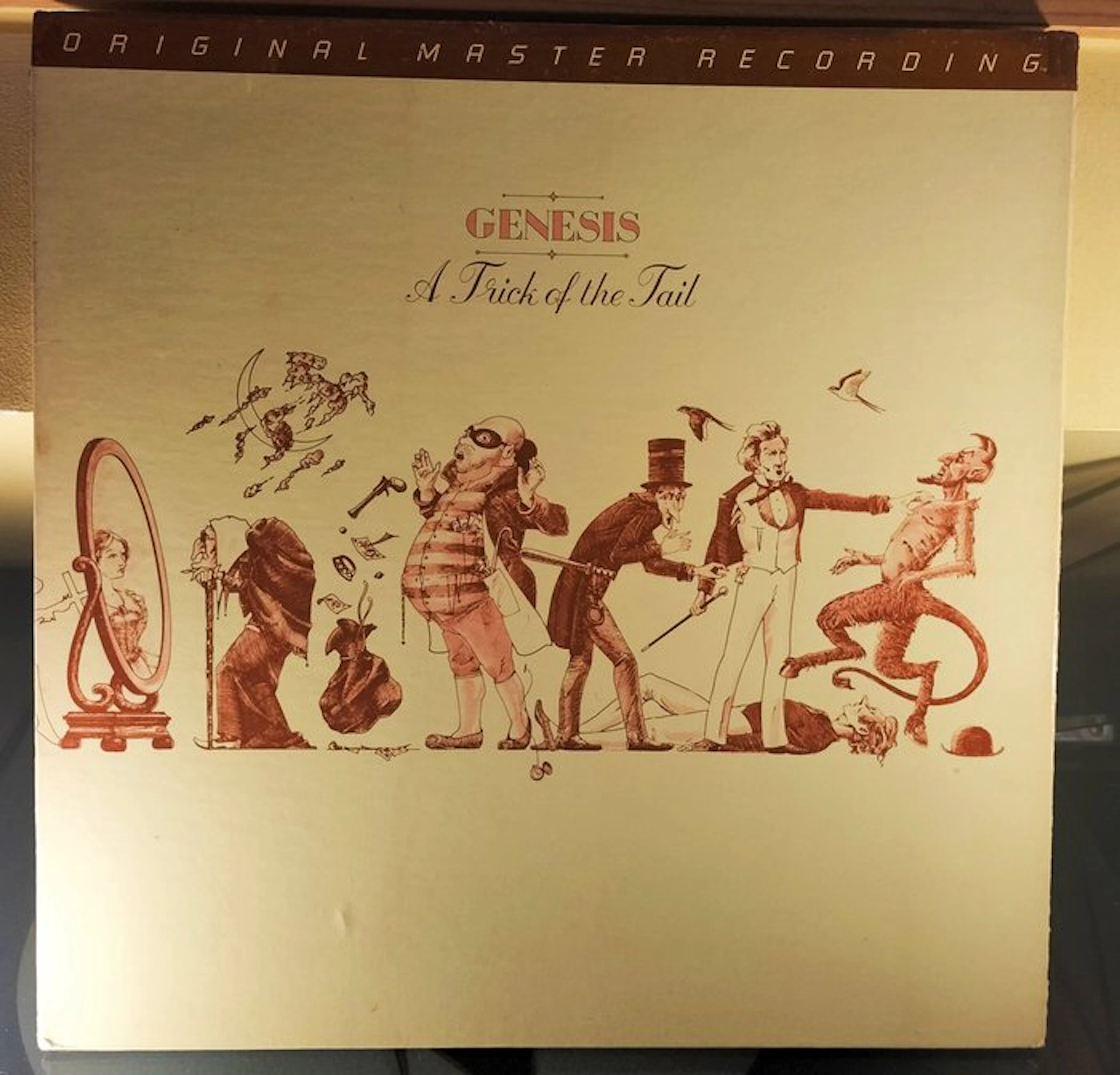 Genesis - A Trick Of The Tail - Limited edition US Mobile...
