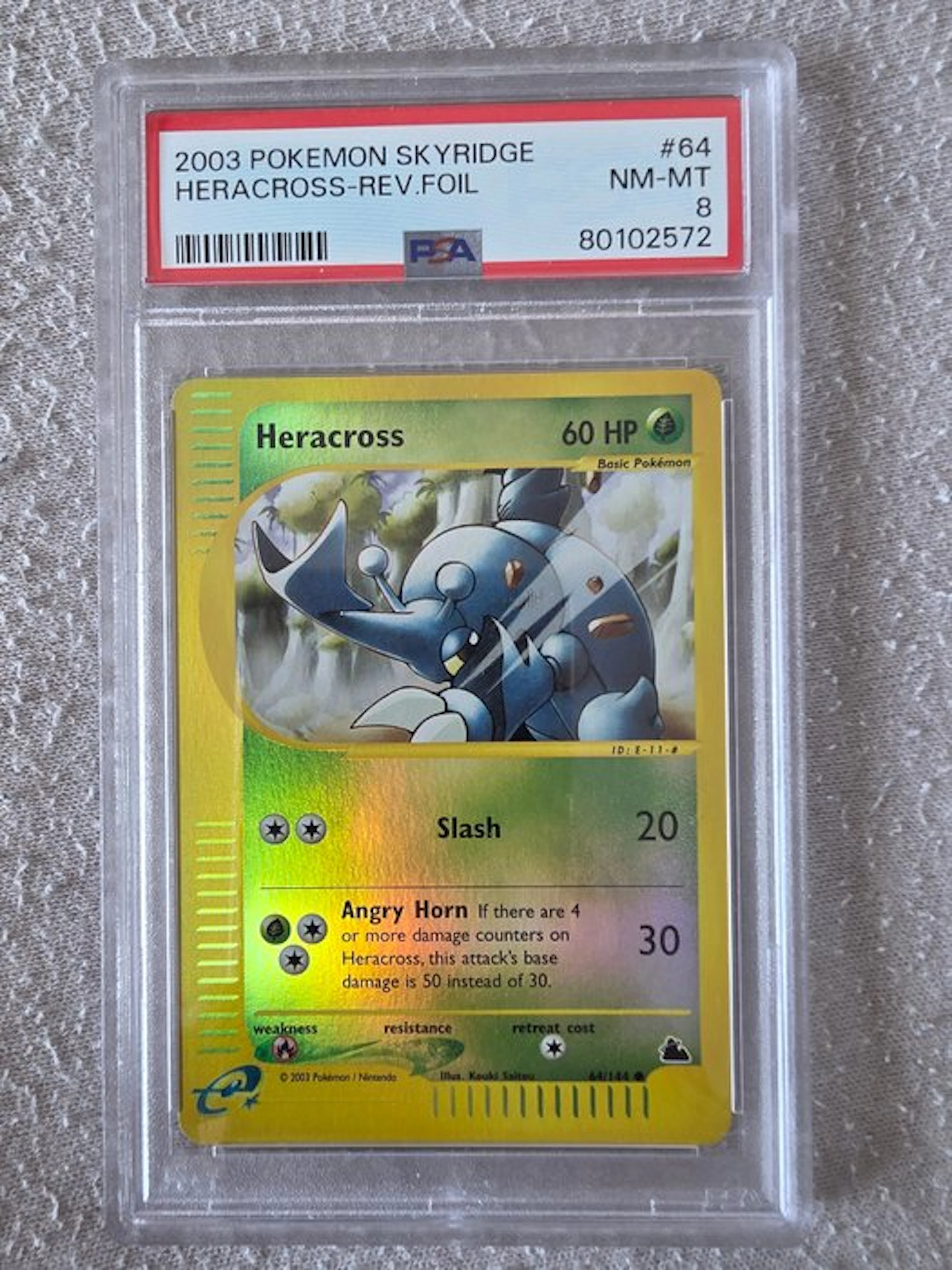 Pokémon - 1 Graded card - Heracross 64/144 Foil - PSA 8