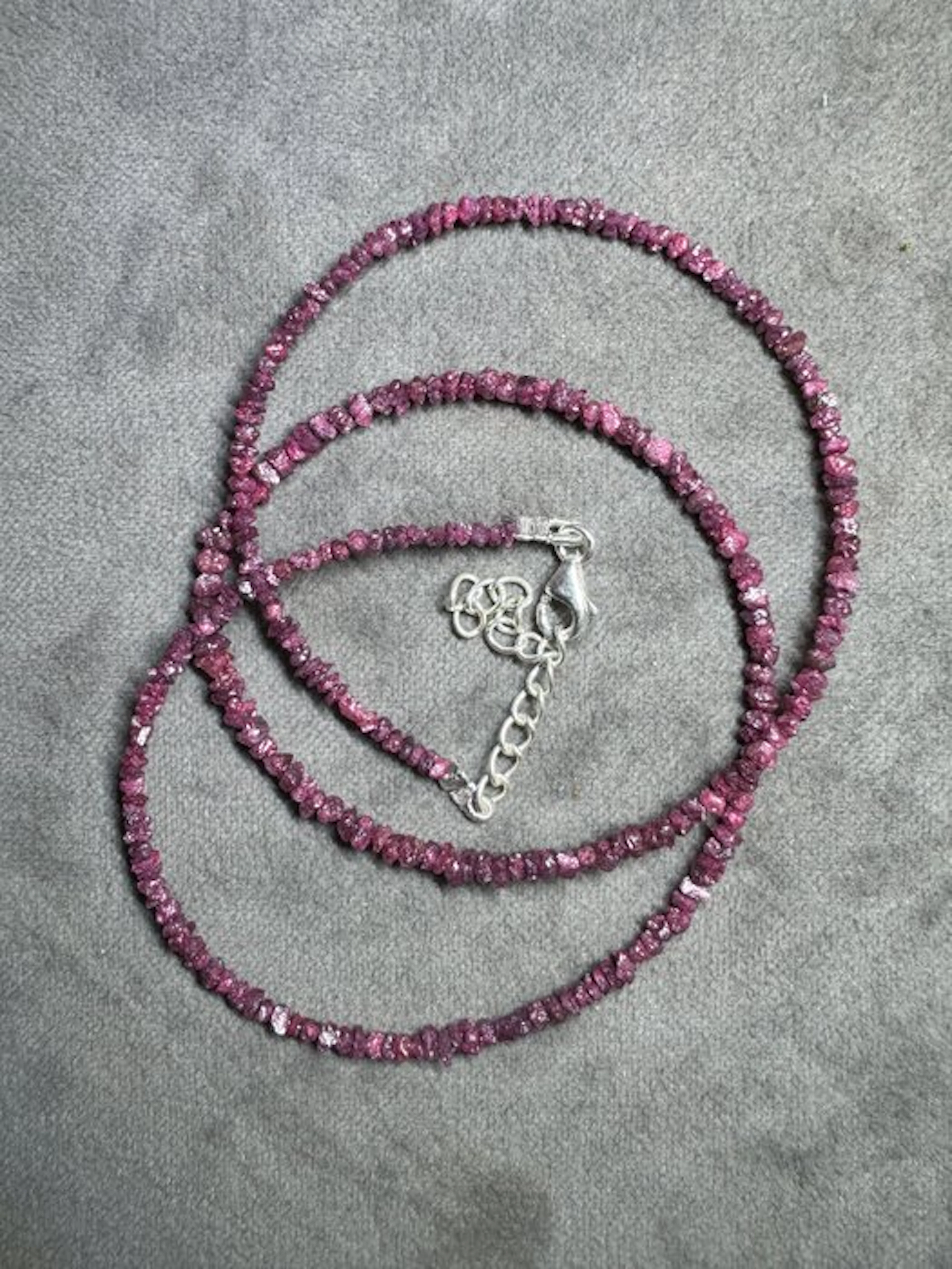 Diamond necklace with ruby-red rough diamonds + 925...