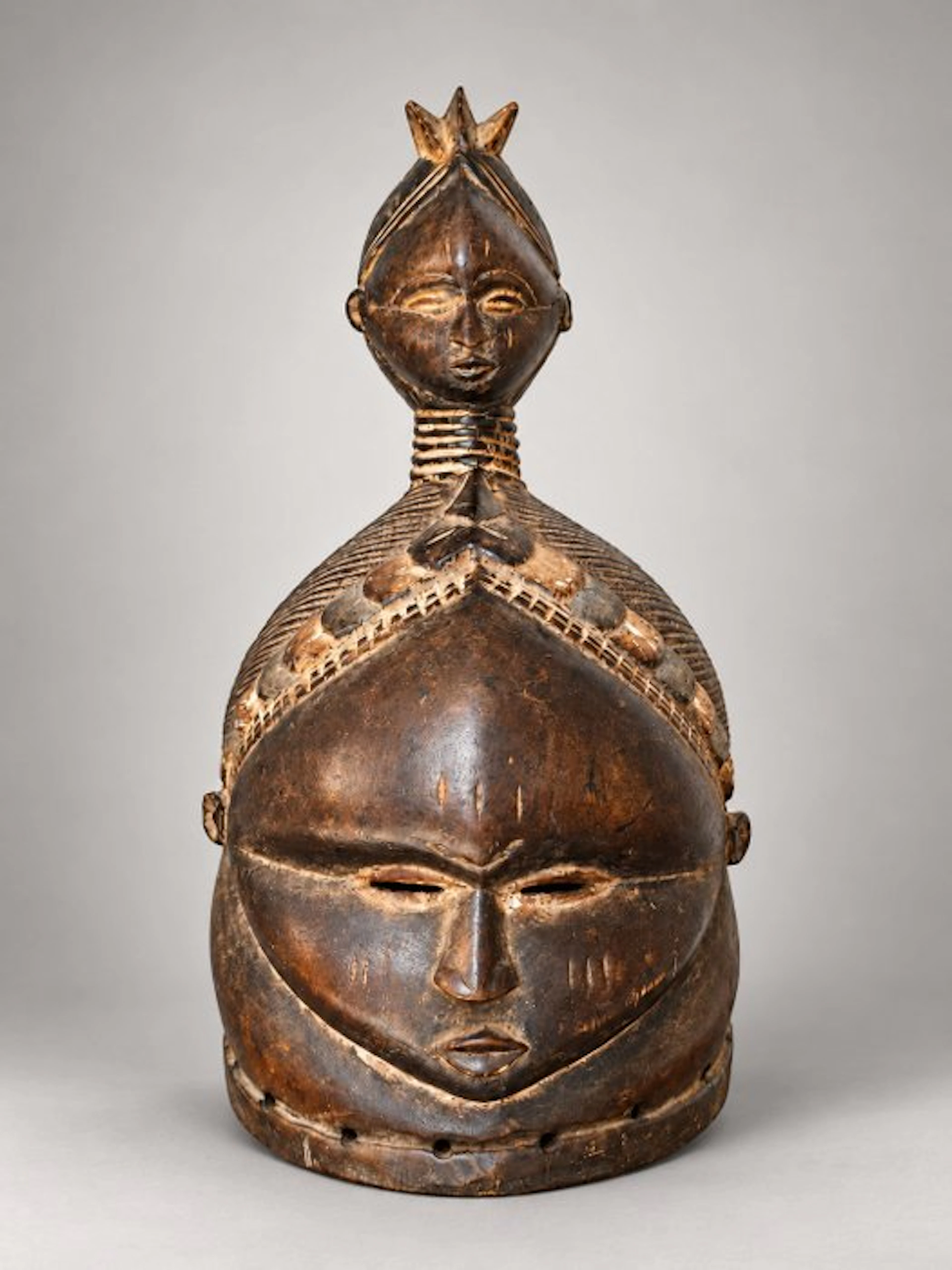 Important carved wooden Sowei/Bundu anthropomorphic mask-helmet