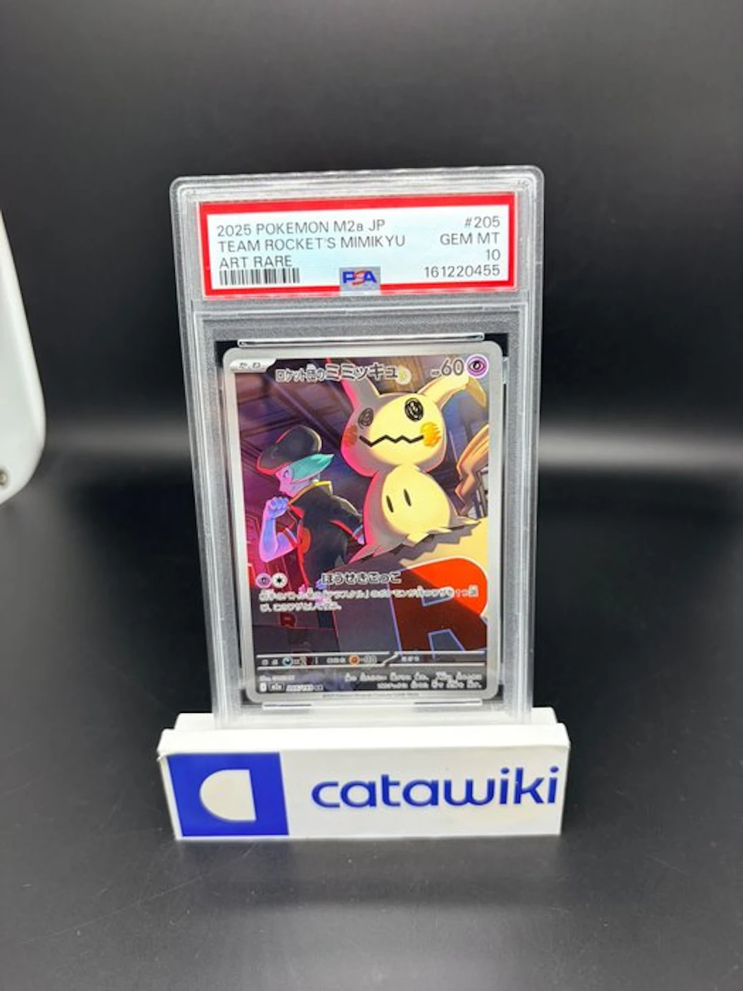 Pokémon - 1 Graded card - Team Rocket's Mimikyu - 205/193...