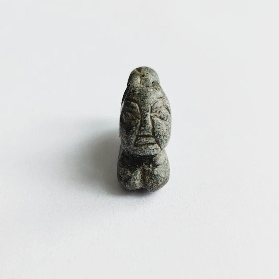 Sino-Siberian or Bactrian Schist Human Faced Resting Tiger Bead Talisman