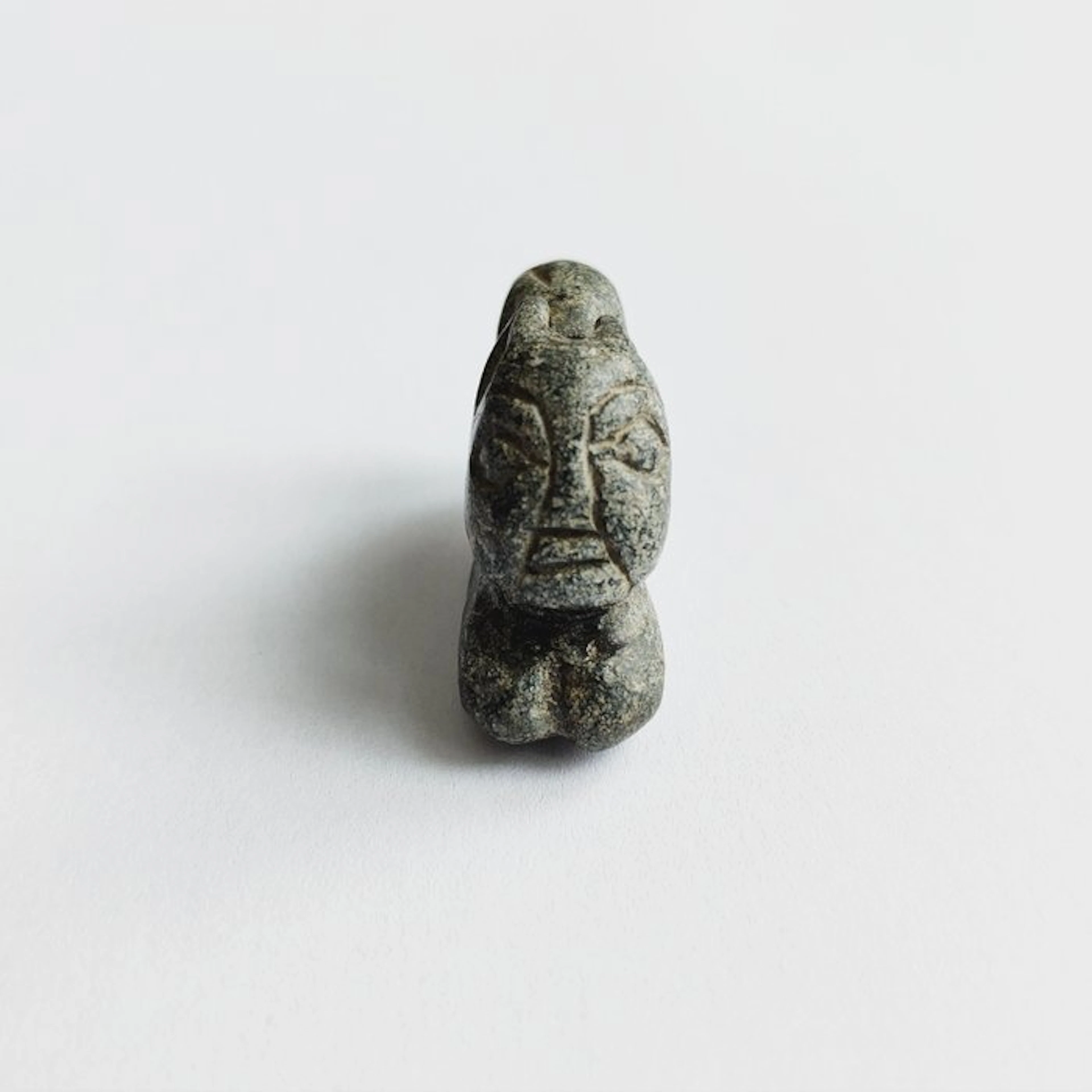 Sino-Siberian or Bactrian Schist Human Faced Resting Tiger Bead Talisman