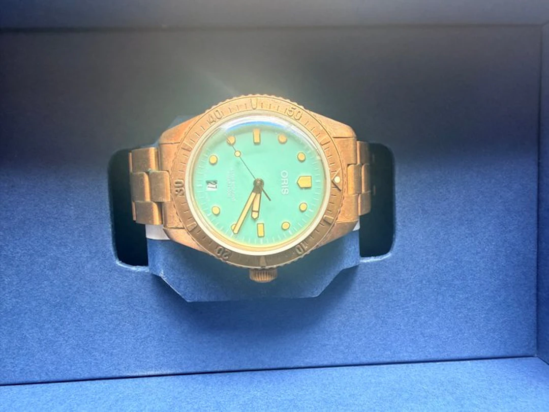 Oris - Divers Sixty-Five Cotton Candy Bronze Automatic...