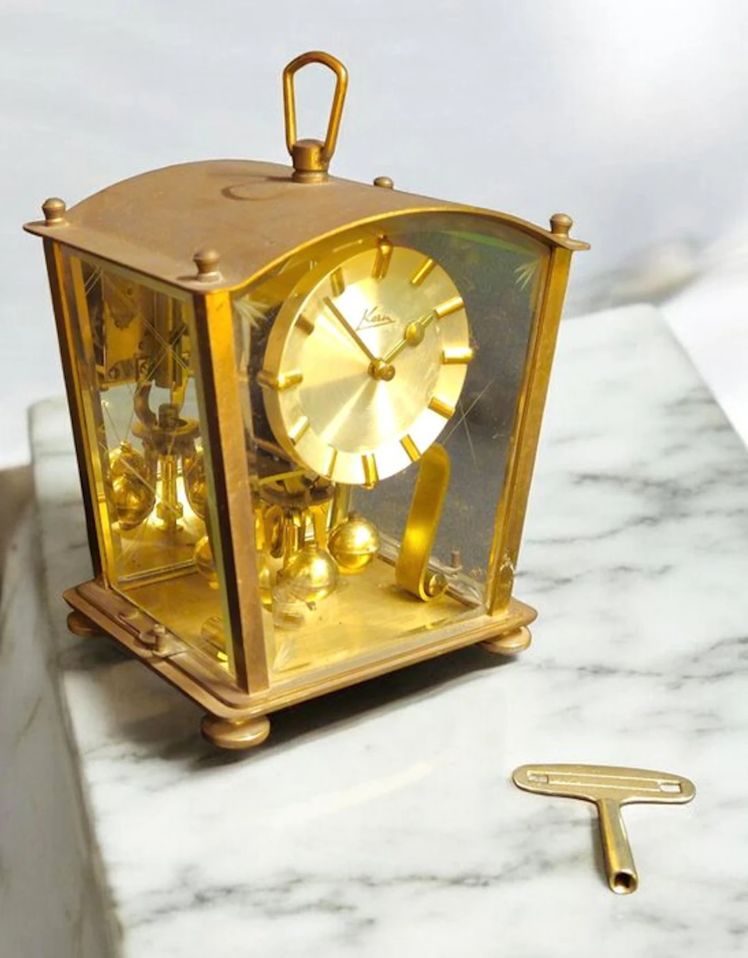 Anniversary clock - Kern & Söhne - Brass, Glass, Metal - 1950-1960
