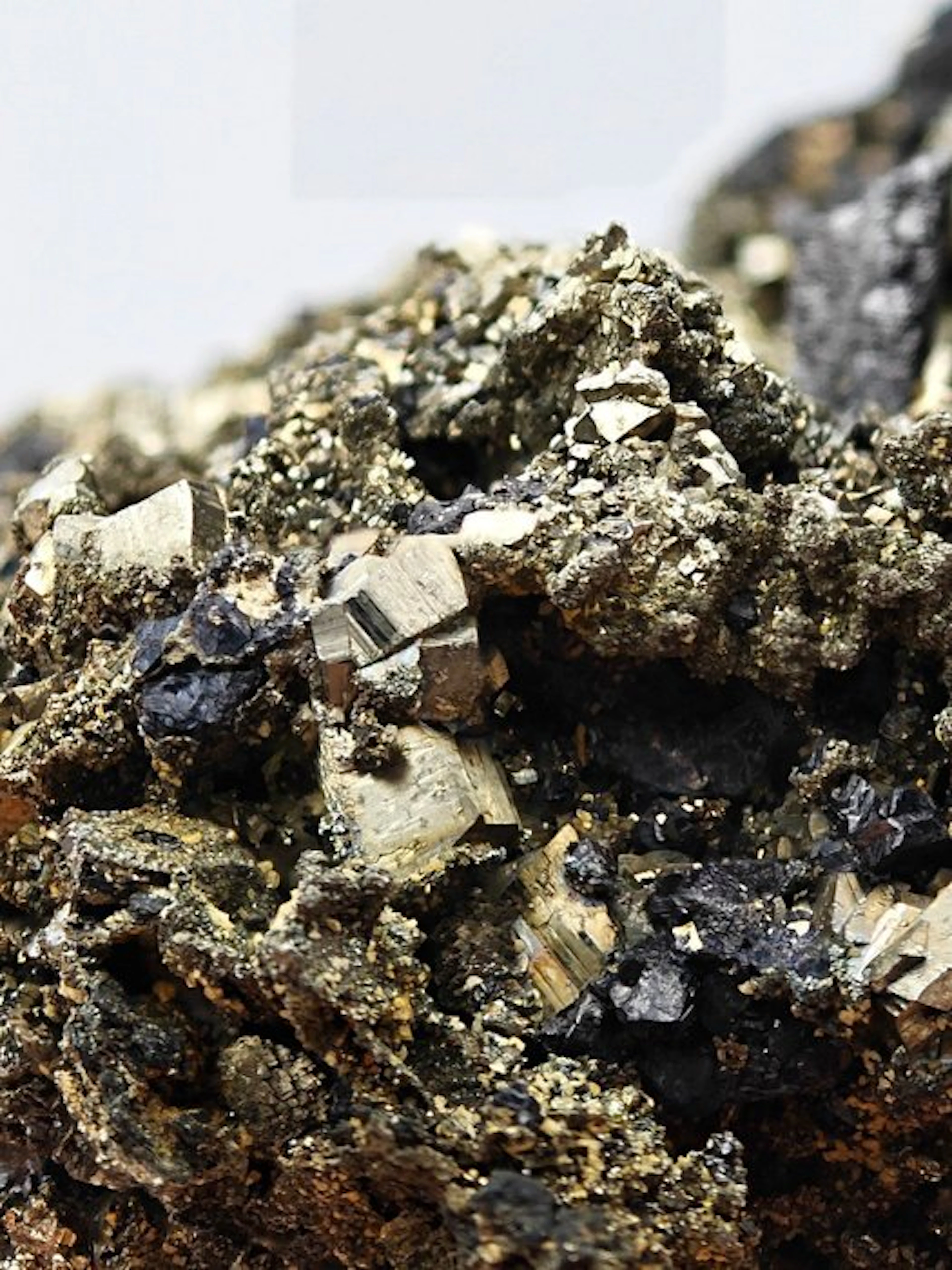 Gilded pyrite aesthetic with black sphalerite Crystals on...