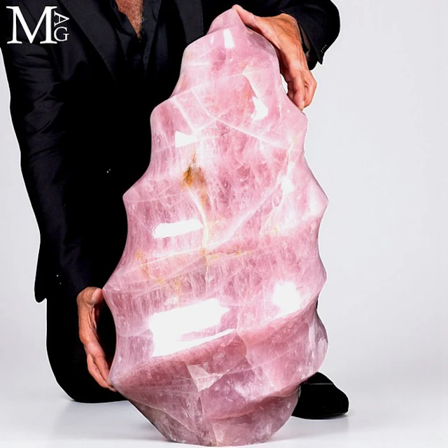 An Impressive Mineral Sculpture - Large Monolithic Rose...