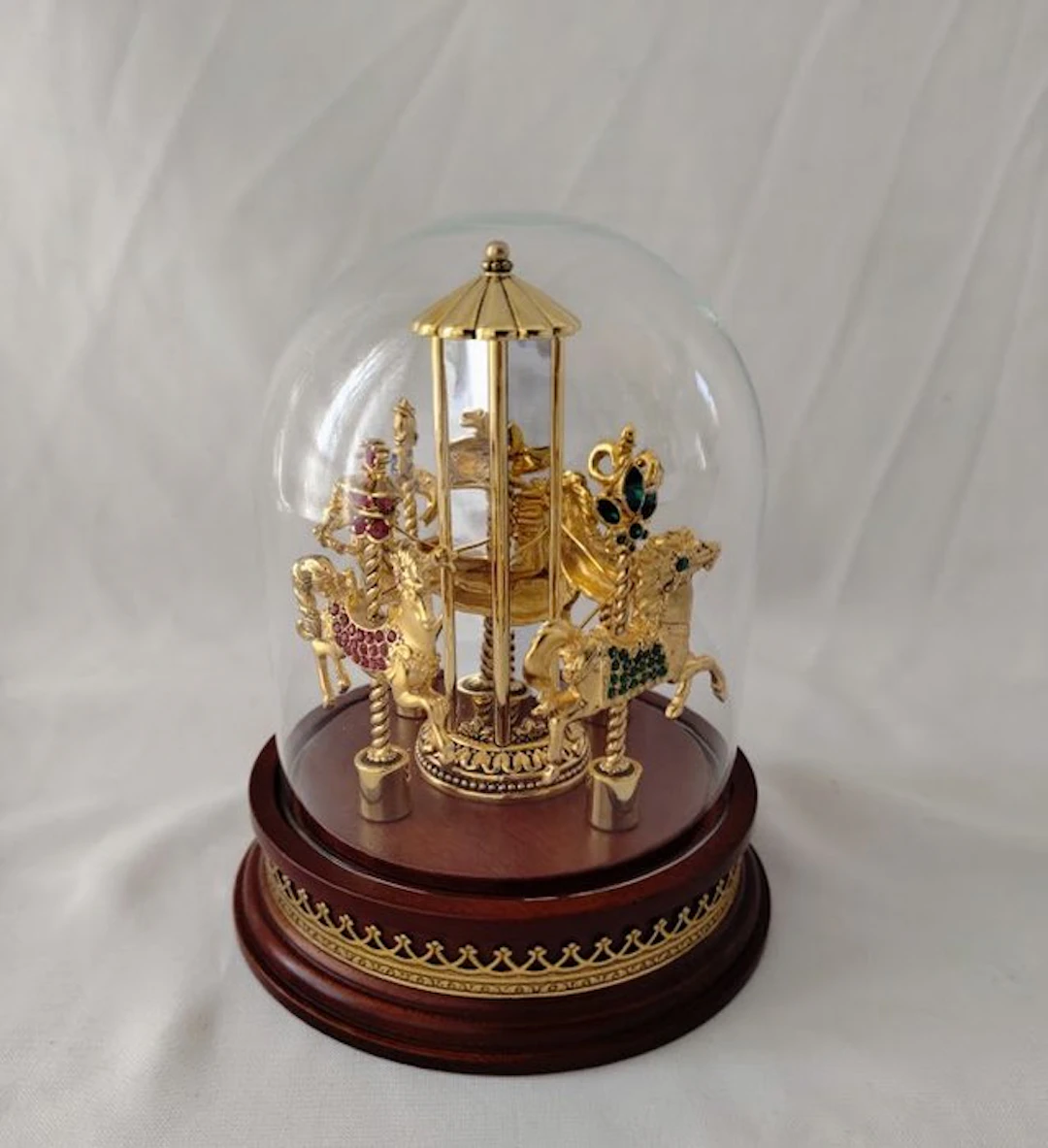 Gold-plated metal - Rhinestones - Mahogany wood - Brass...