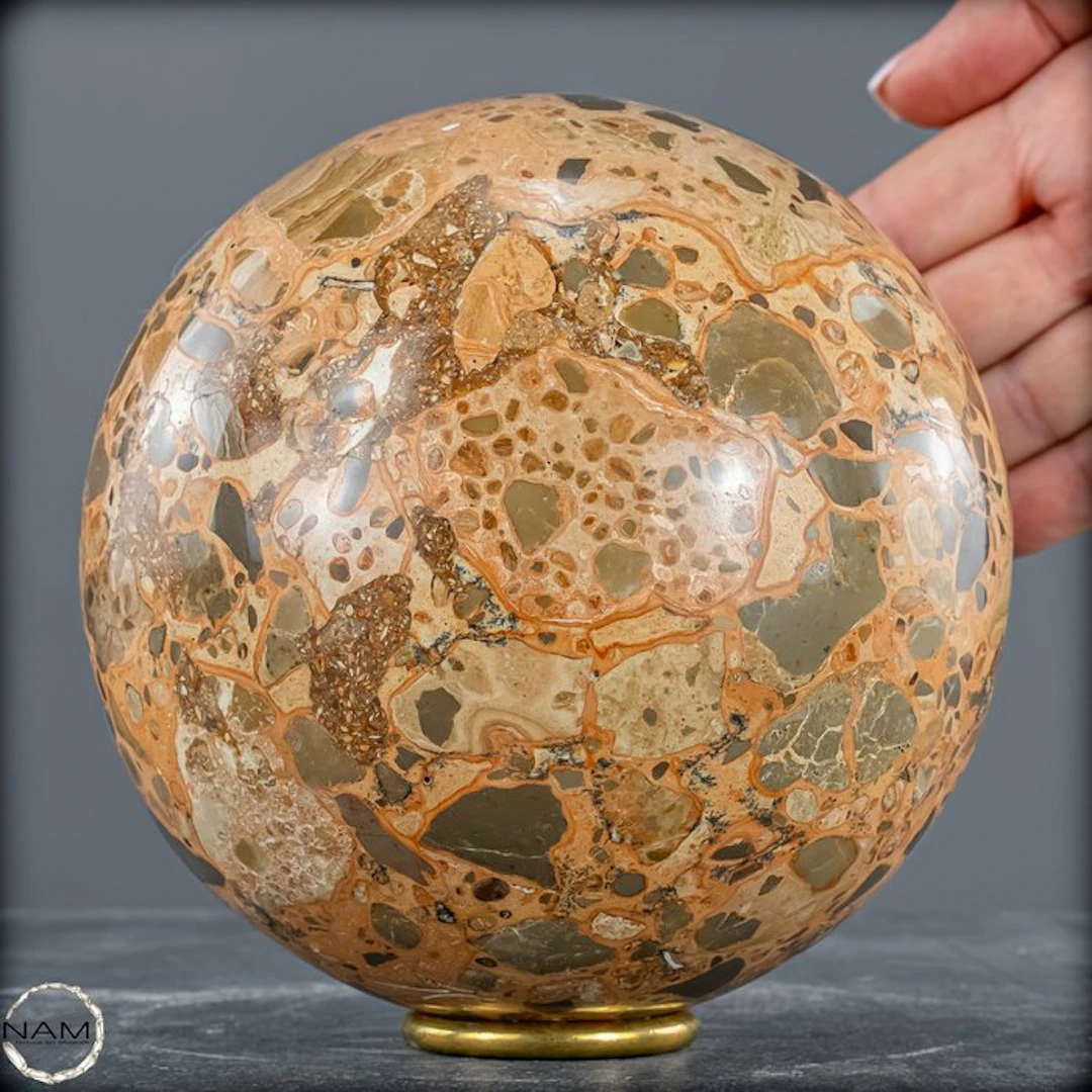 Natural Leopard Jasper – an expressive sphere with earthy depth.- 3021.57 g