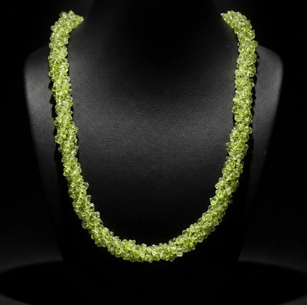 Three-row twisted chain with peridot. - Necklace