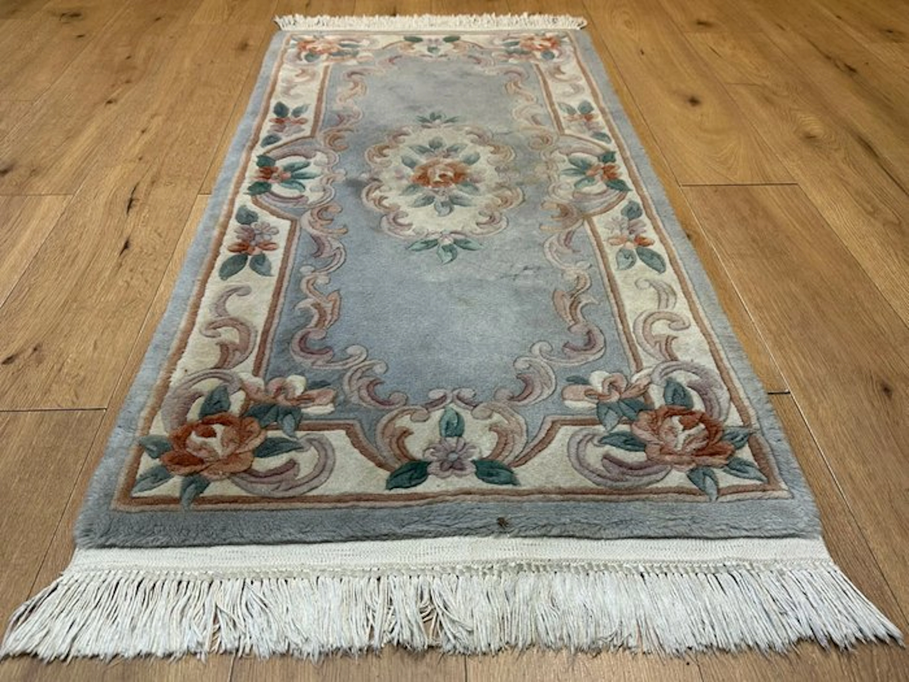 Elegant Chinese Aubusson rug with a classic rose pattern in soft pastel tones