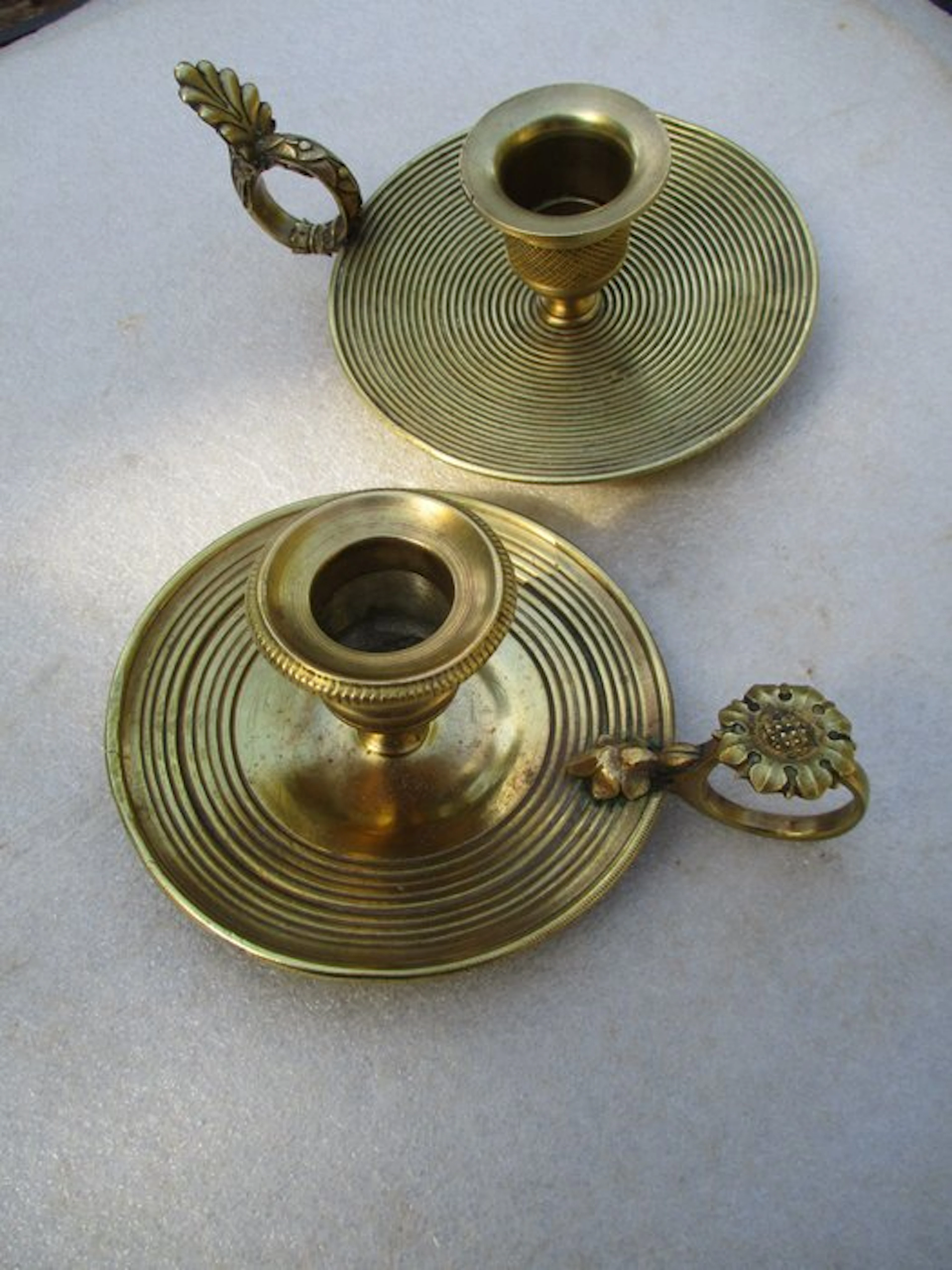 Taperstick (2) - Lot 2 hand candlesticks