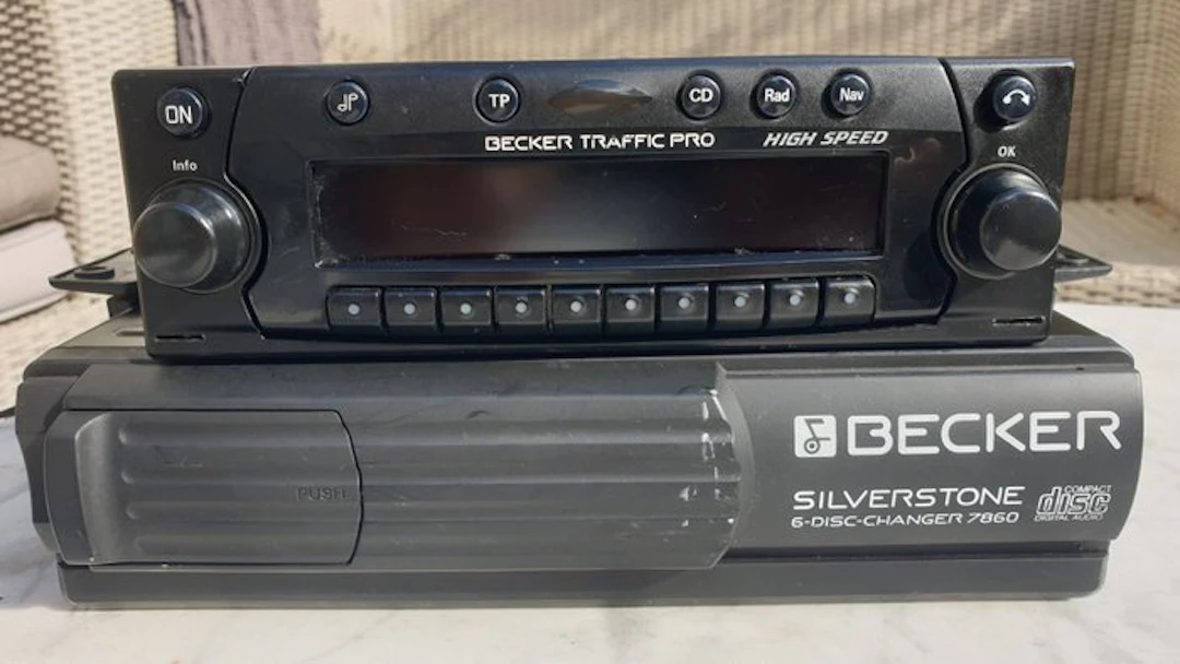 Becker Harman/Kardon - Traffic Pro high speed met Silverstone cdc Autoradio