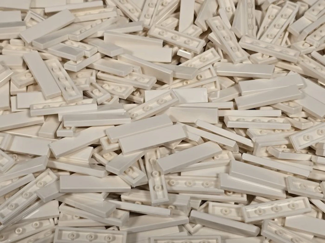 LEGO Pieces - 750 nieuwe gladde plaatjes tiles 1x4 wit