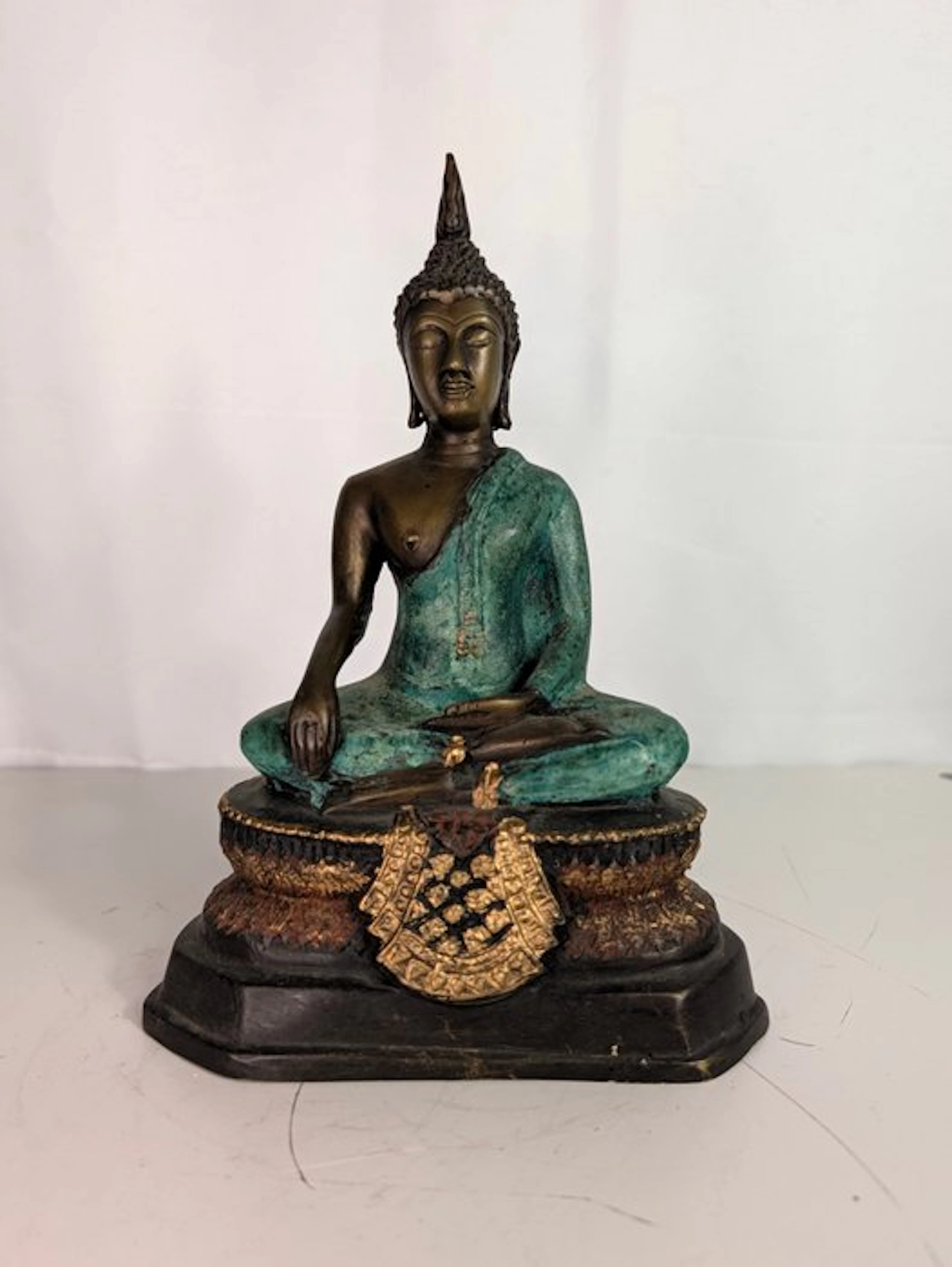 Seated Buddha in the Bhumisparsha Mudra – Bronze – green...