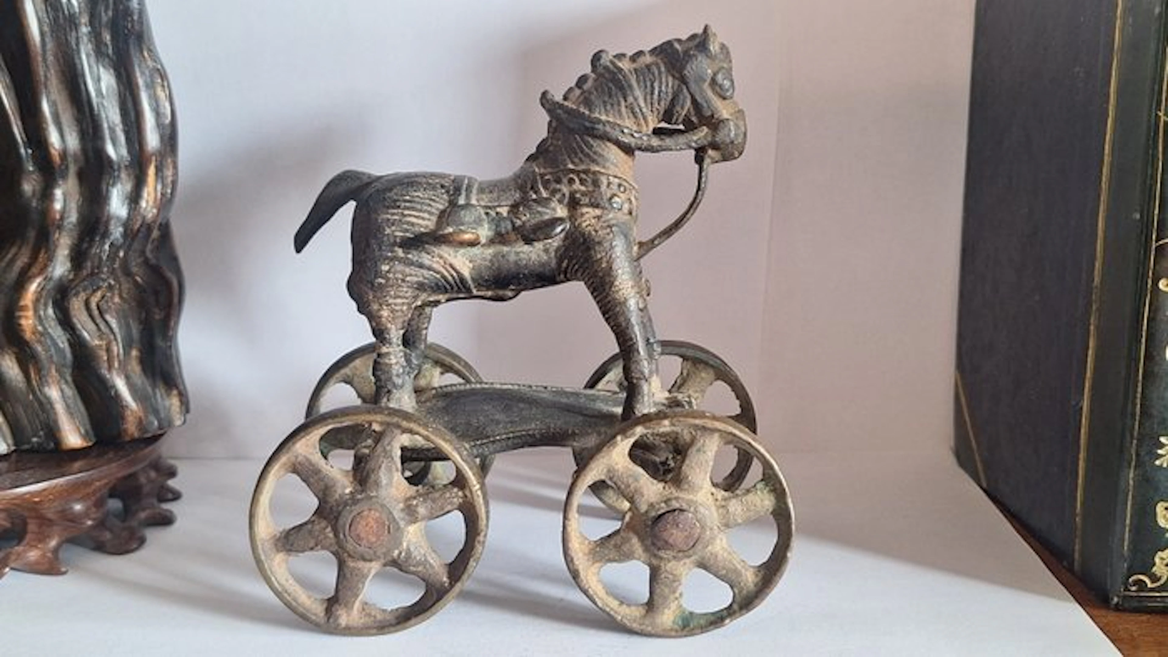 An Indian votive horse figurine with a beautiful patina