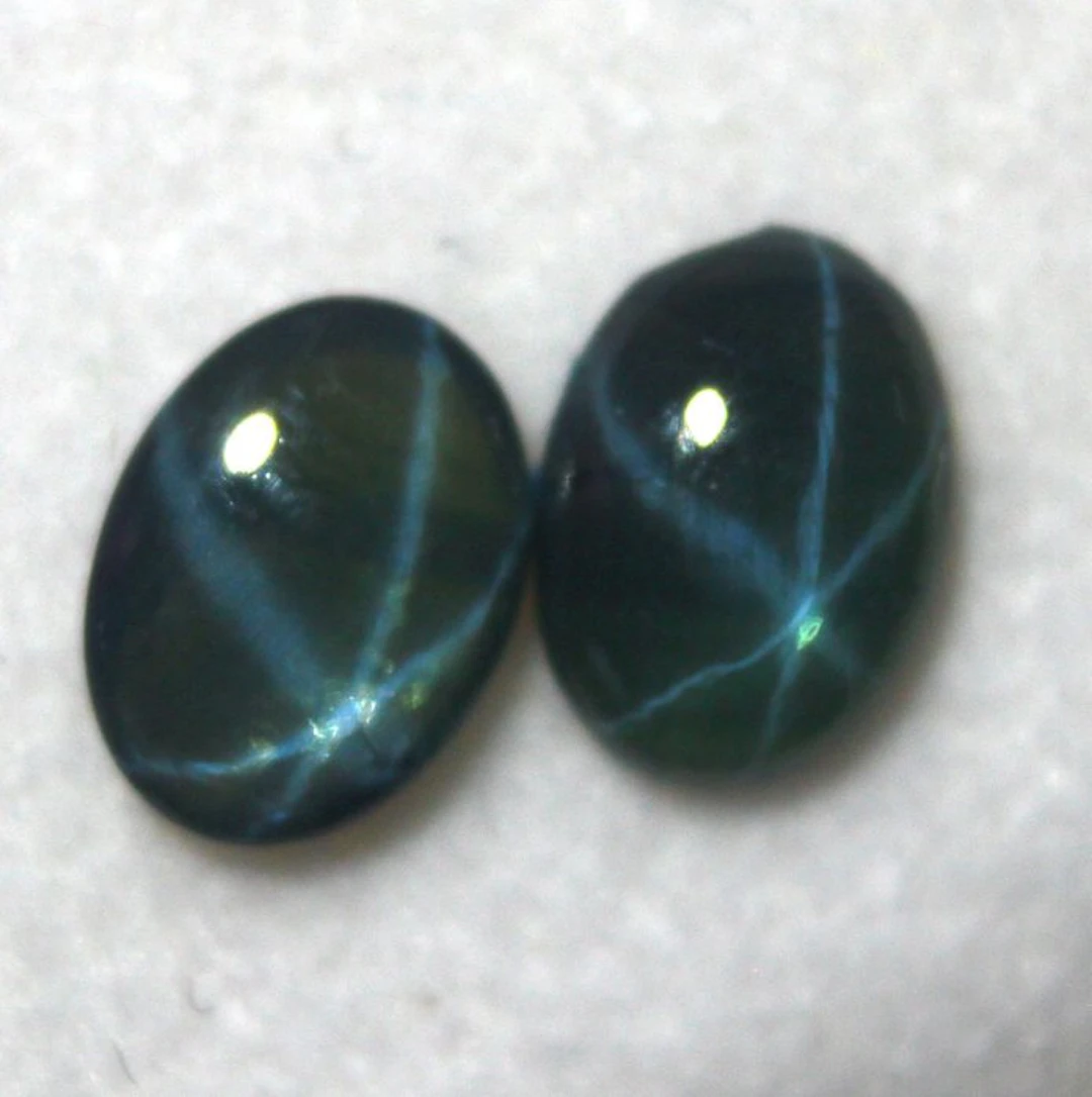 Ct. 1.15 Star Sapphire Pair Cabochons - Height: 7 mm - Width: 5 mm- 0.23 g