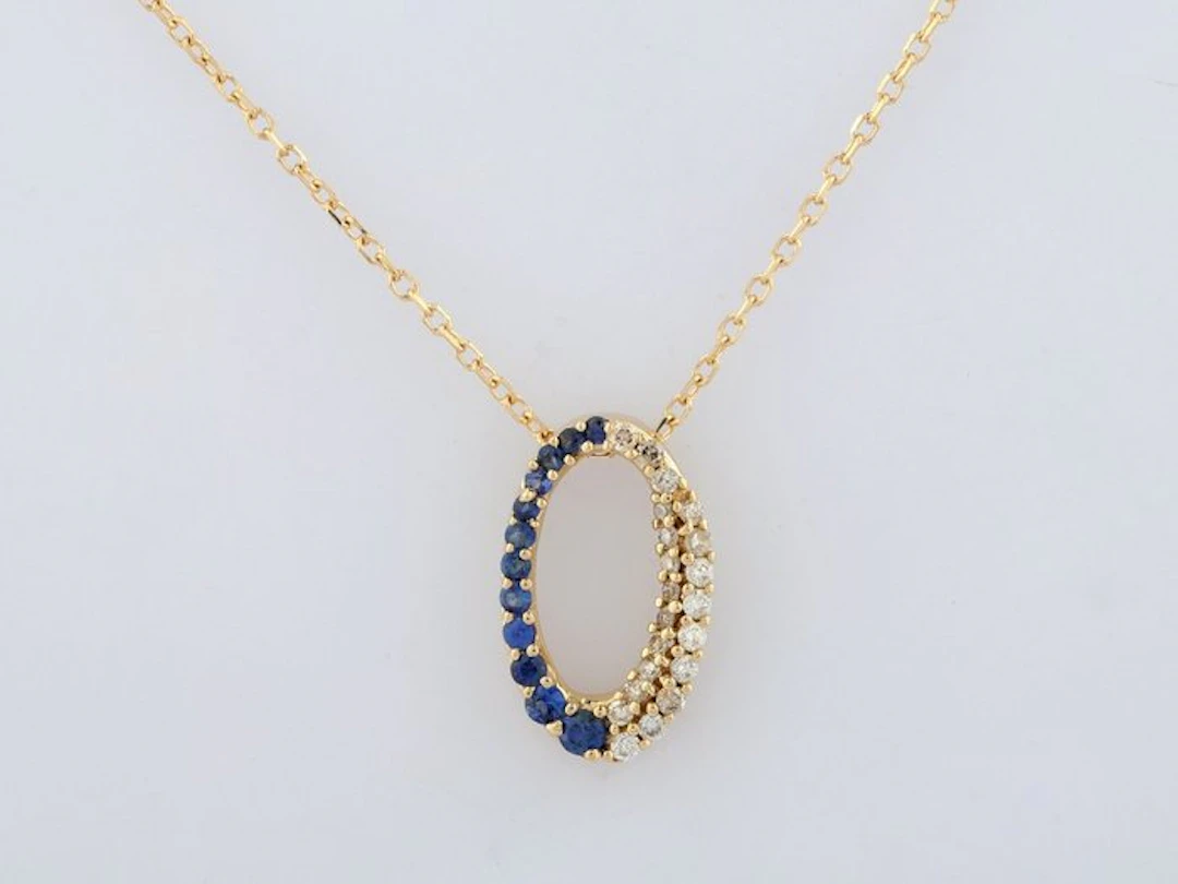 Necklace with pendant - 14 kt. Yellow gold - 0.24ct. tw. Sapphire - Diamond