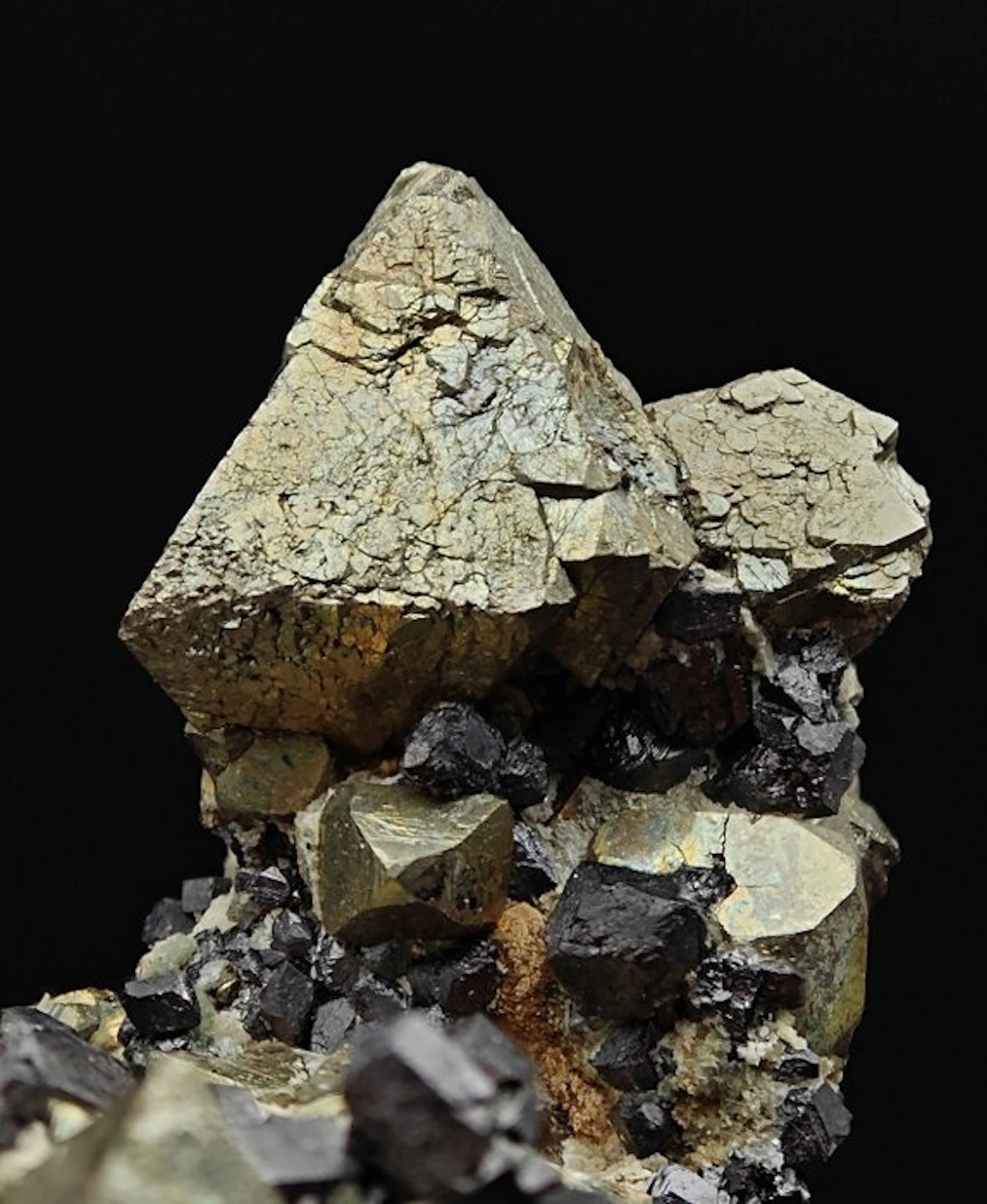 Gold-colored octahedral pyrite aesthetic with black magnetite