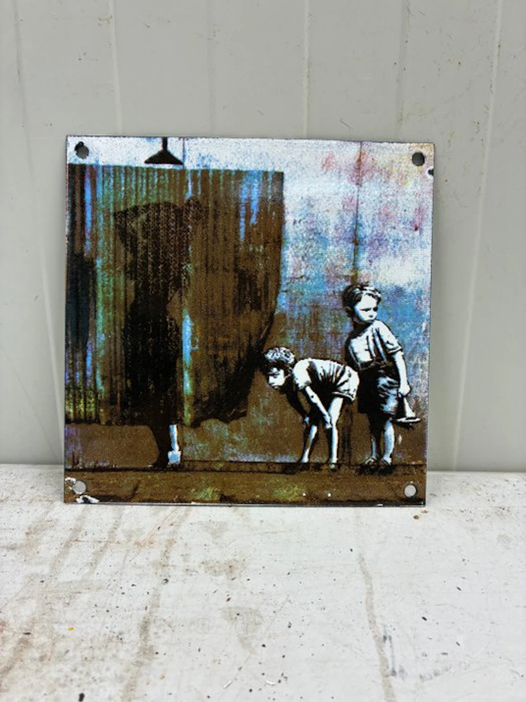 Enamel wall sign in Banksy style – children with a...