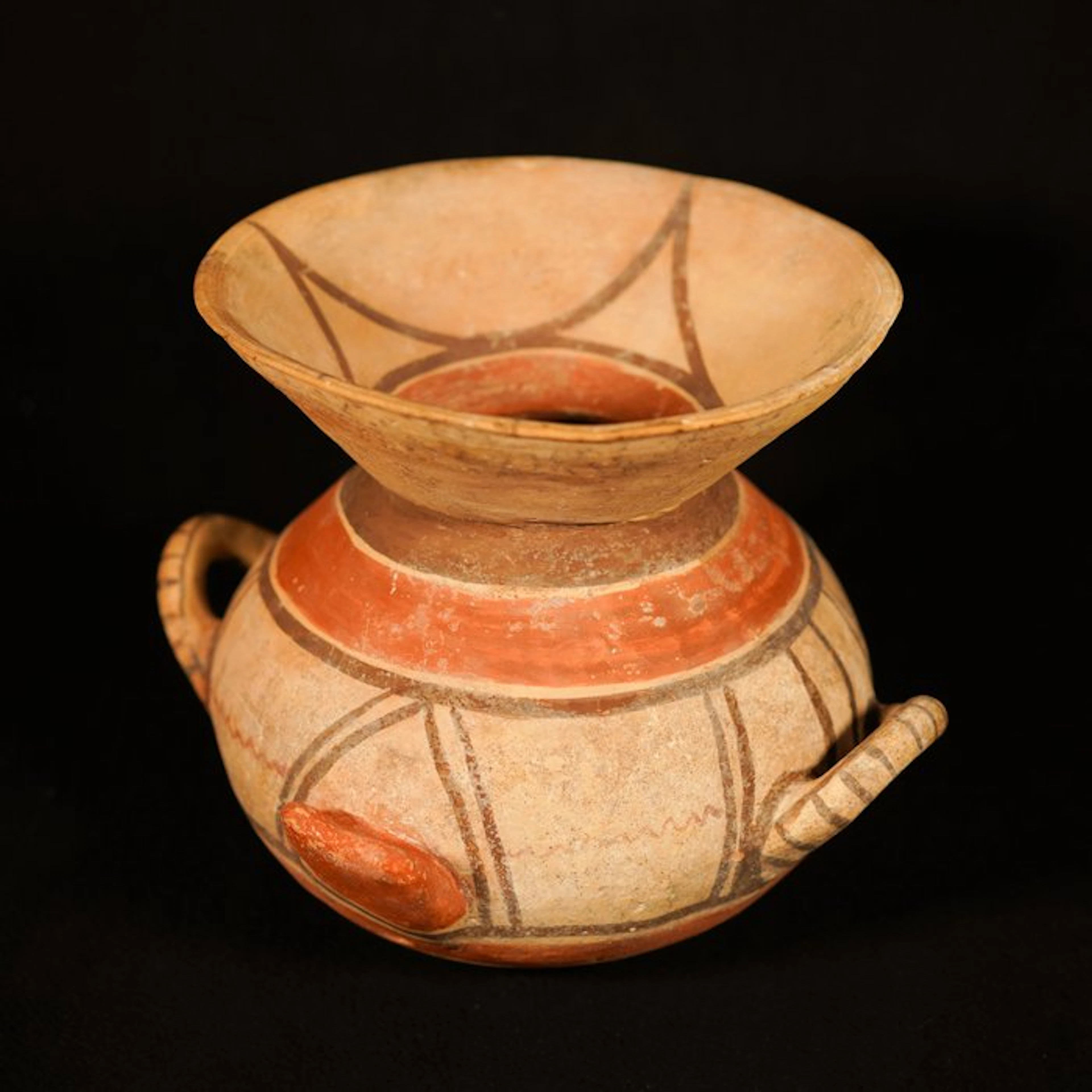 Daunian Ceramic A very large pot with two loop-shaped...
