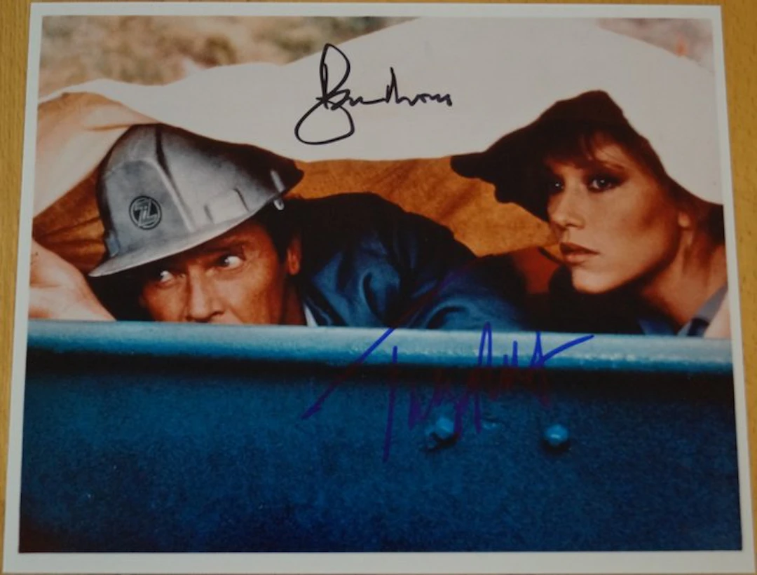 James Bond 007: A View To a Kill - Roger Moore (+) as 007 with Tanja Roberts double signed - signed photo with bbc holographic COA