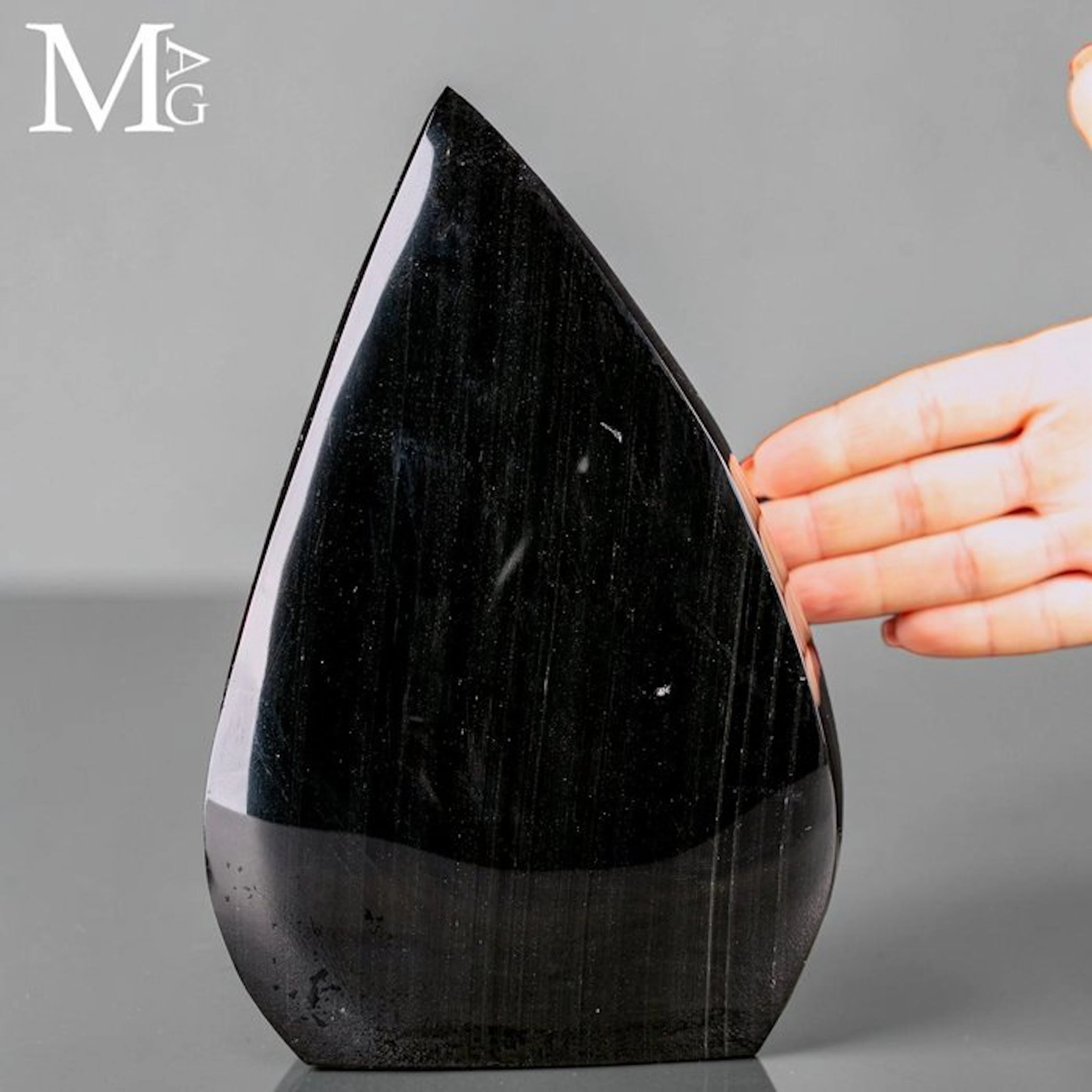 Lustrous Black Obsidian with Subtle Silver Sheen and...