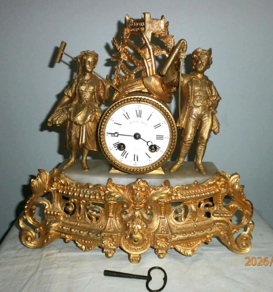 Figural mantel clock - regule and marble - 1850-1900