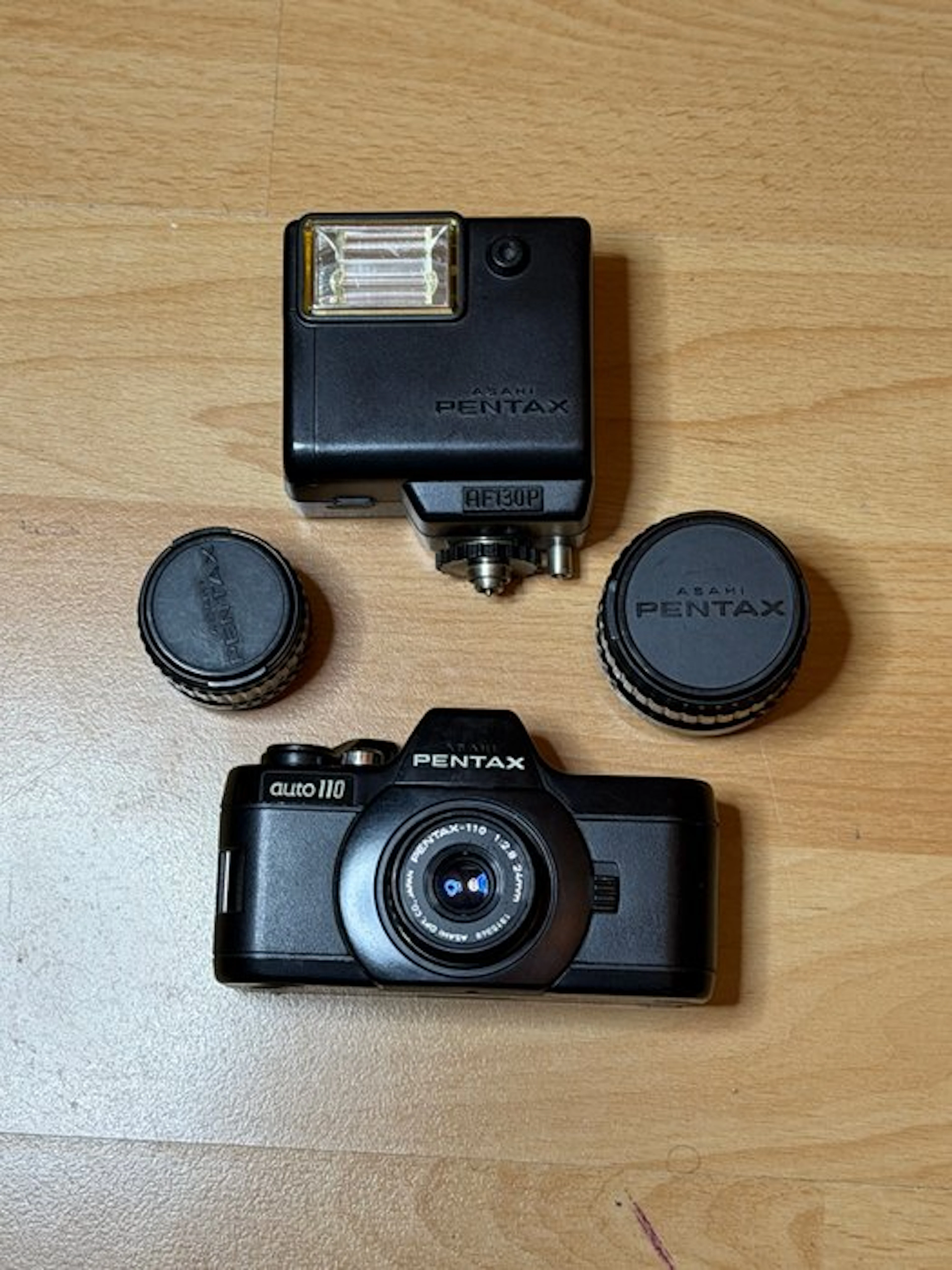 Pentax auto 110 + 2,8/18 mm + 2,8/24 mm + 2,8/50mm + flash | Analogue camera