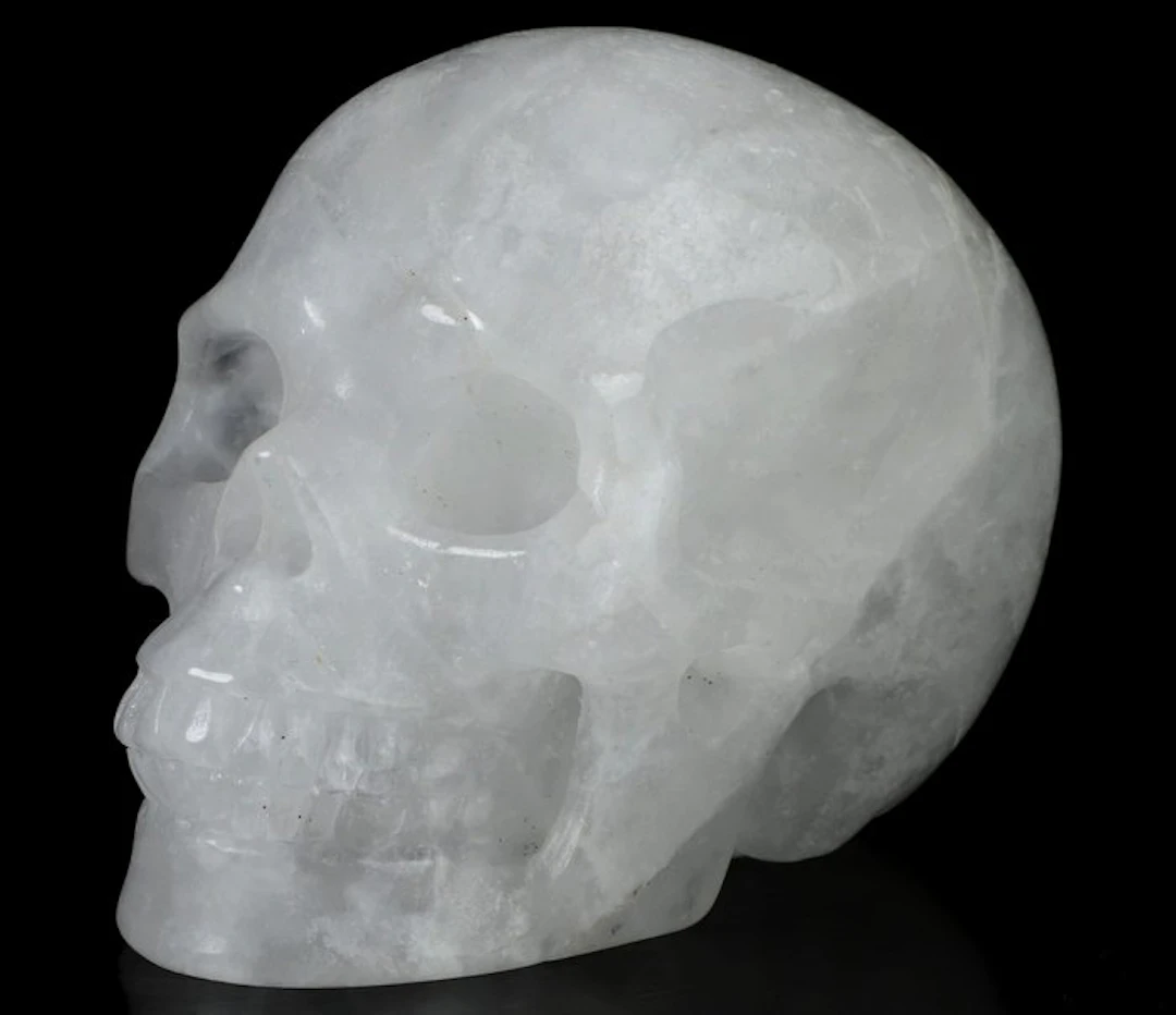 102 g 5.20 x 3.80 cm mountain quartz skull - very fine...