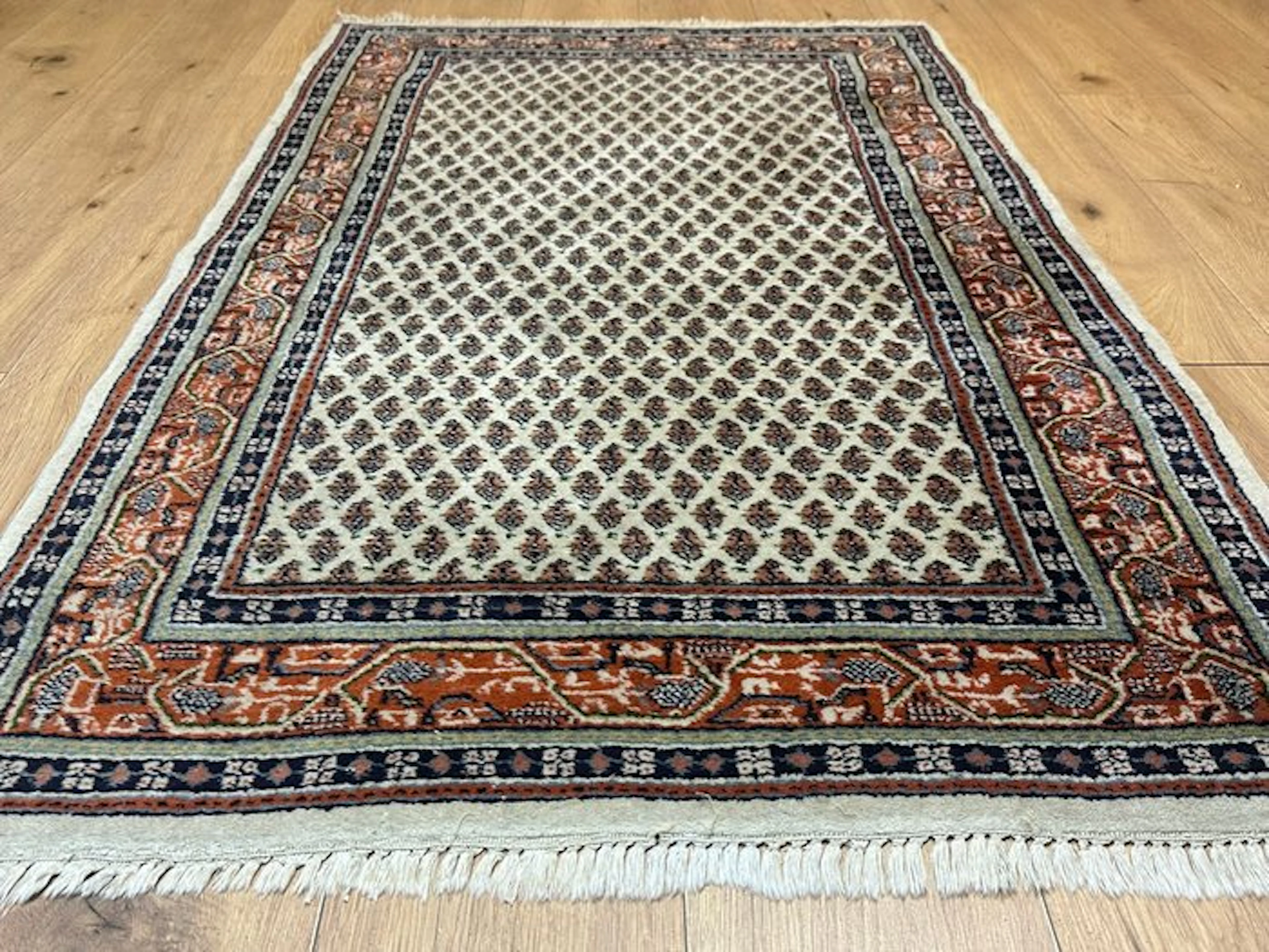 A fine antique Oriental rug in the Sarough-Mir style